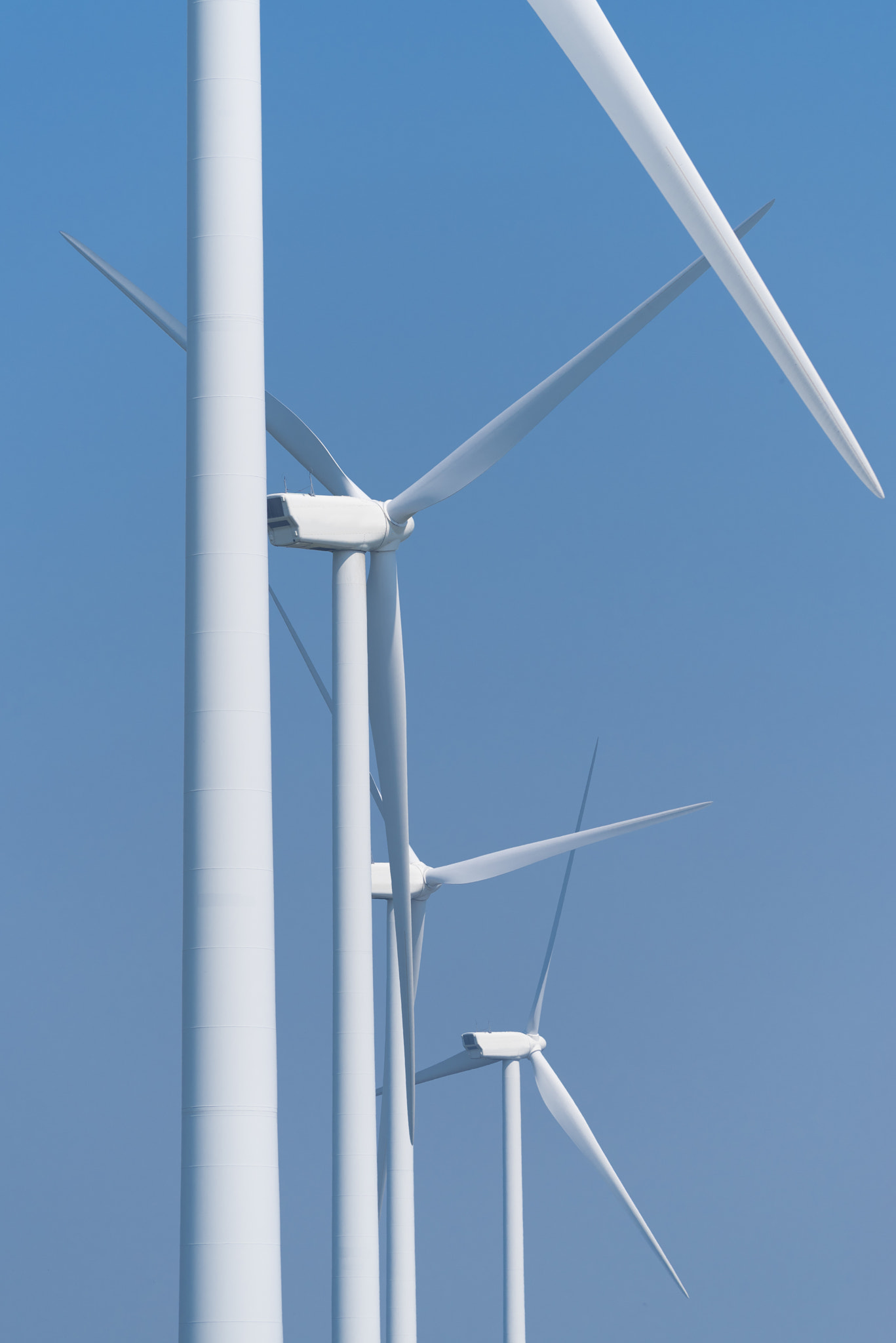 Pentax K-1 + Tamron SP AF 70-200mm F2.8 Di LD (IF) MACRO sample photo. Wind turbines against blue sky photography