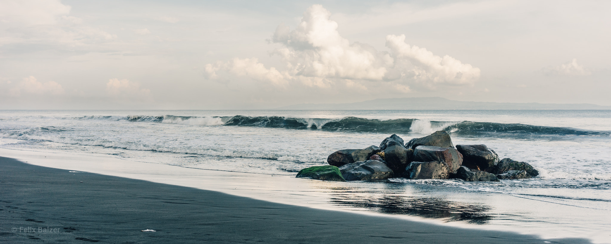 Sony a7 + Sony Sonnar T* FE 35mm F2.8 ZA sample photo. Black sand beach photography