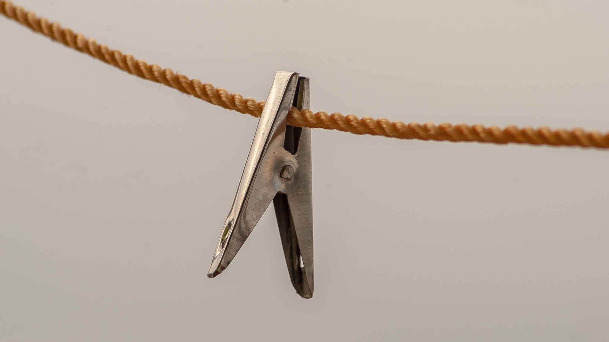 Nikon D3000 sample photo. Clothespin and rope photography