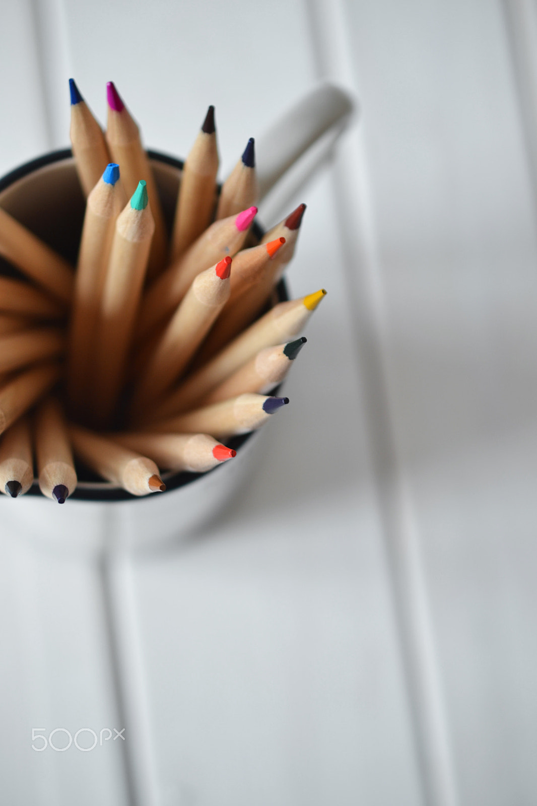 Nikon AF-S DX Micro Nikkor 40mm F2.8 sample photo. Colored pencils spiraled in pitcher photography