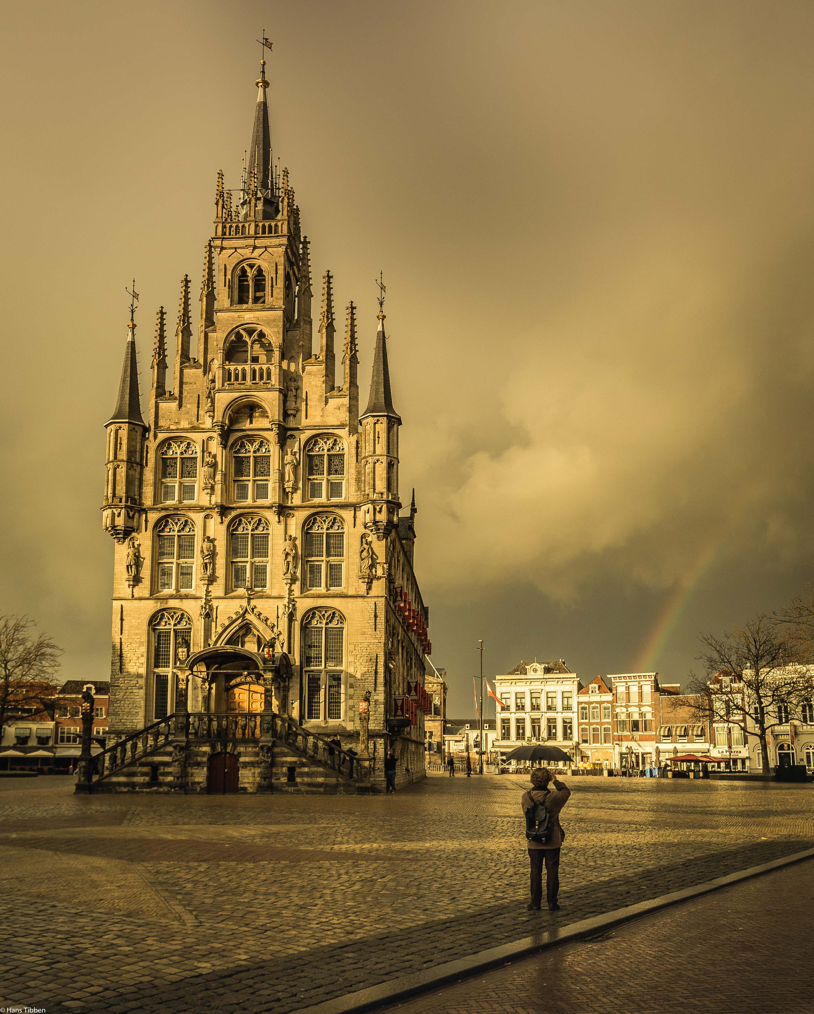 Canon EOS 6D + Canon EF 300mm f/2.8L sample photo. Man with umbrella and rainbow photography