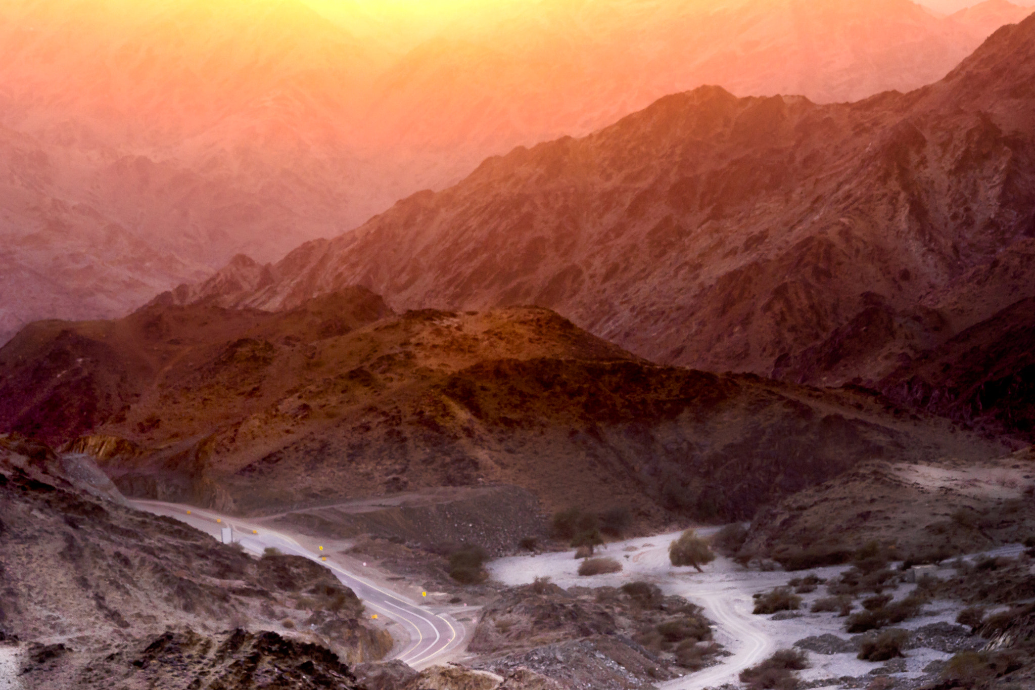 Sigma 70-300mm F4-5.6 APO DG Macro sample photo. Setting behind the mountains photography