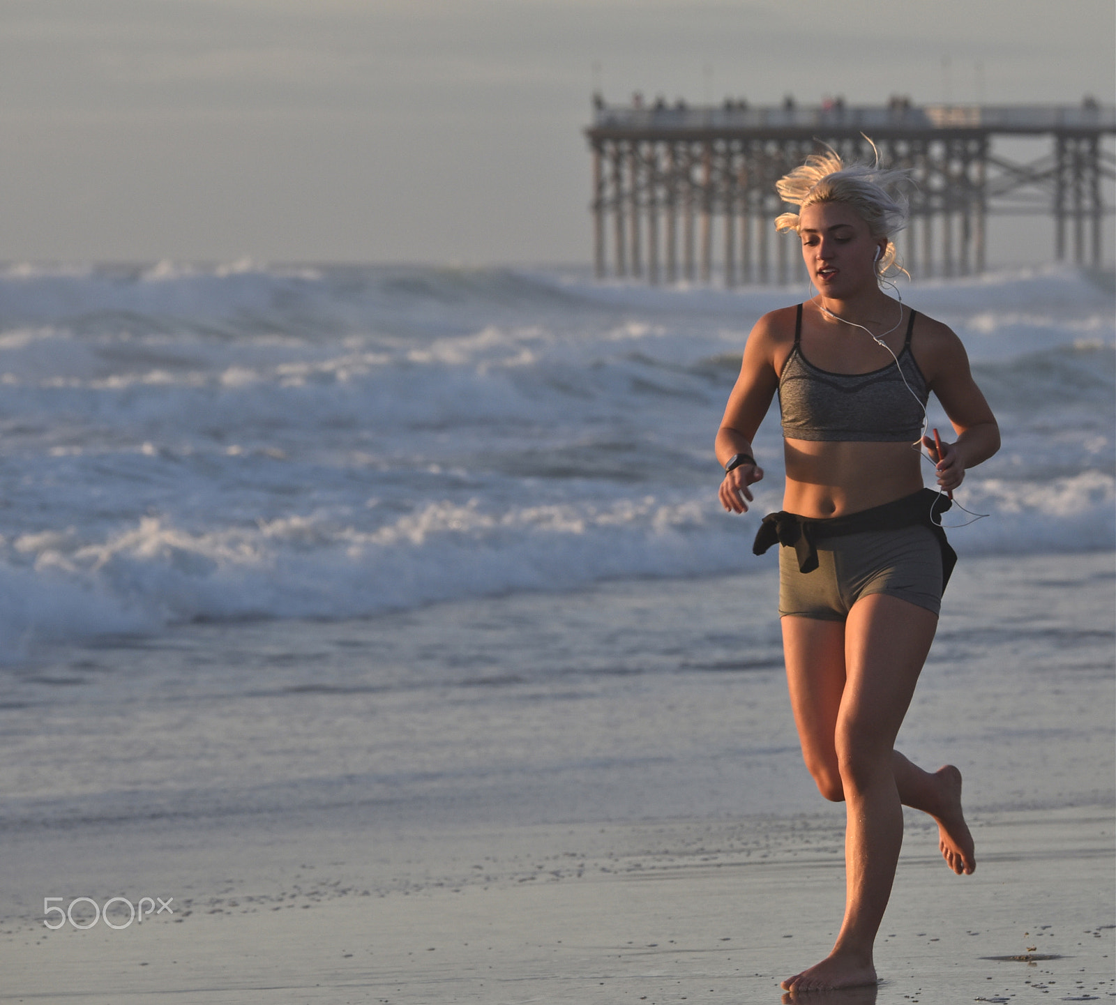 Nikon D750 + Nikon AF-S Nikkor 80-400mm F4.5-5.6G ED VR sample photo. Young fit woman running along beach. photography