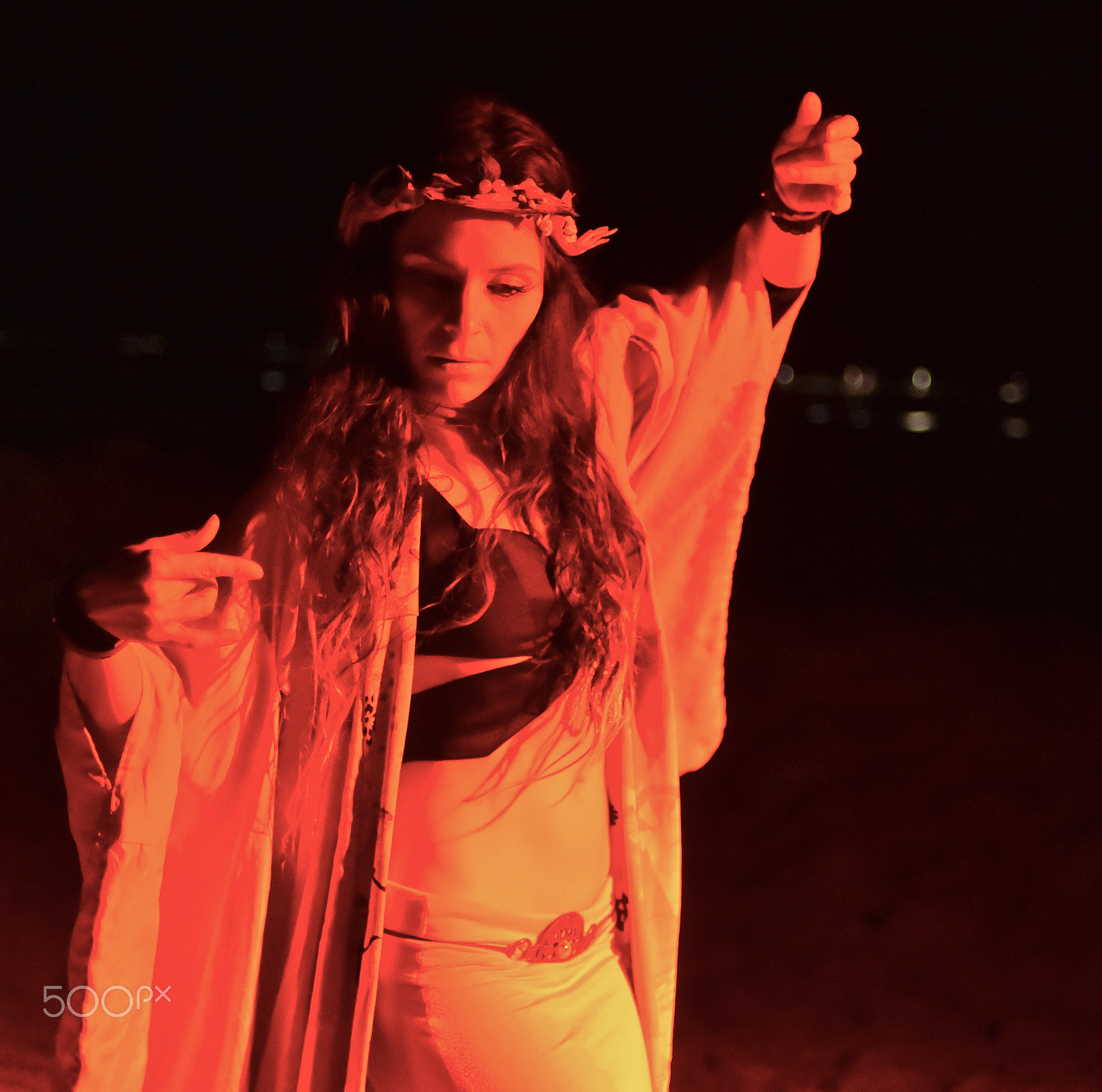 Nikon AF Nikkor 35mm F2D sample photo. Woman performer at night on beach photography