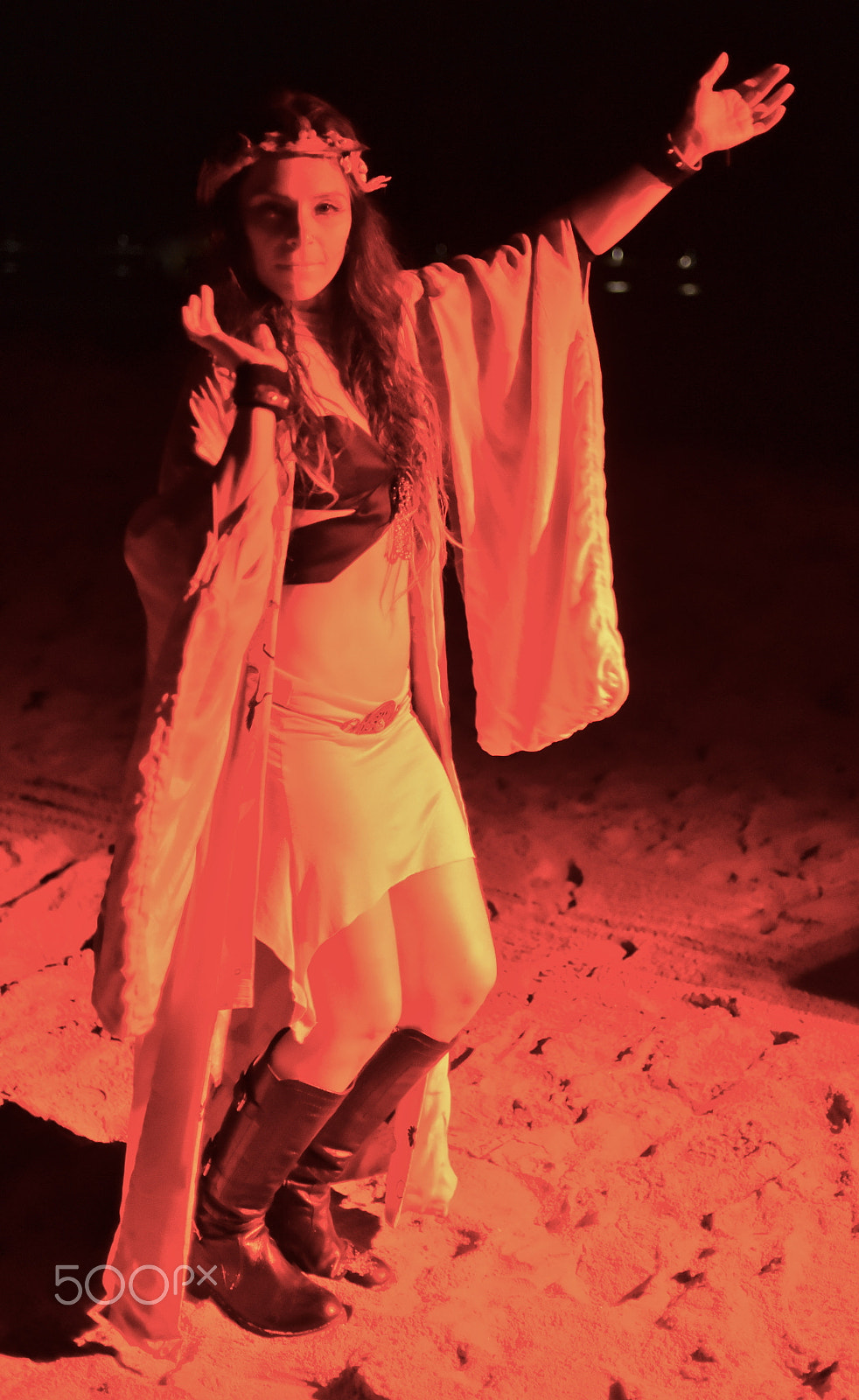 Nikon AF Nikkor 35mm F2D sample photo. Woman performer at night on beach photography