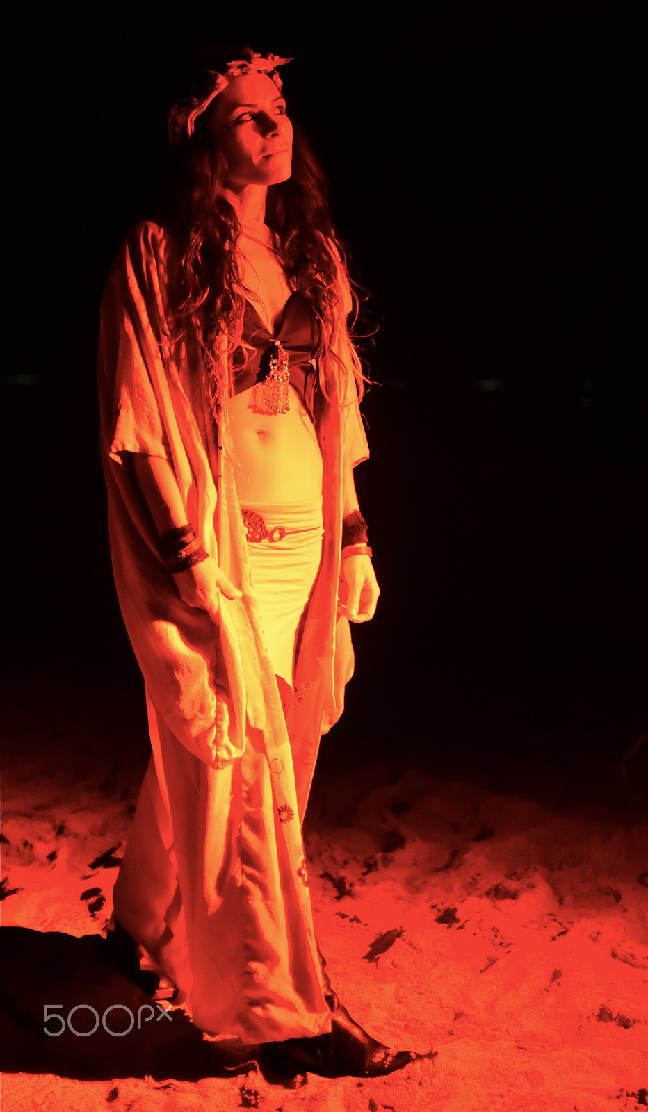 Nikon AF Nikkor 35mm F2D sample photo. Woman performer at night on beach photography