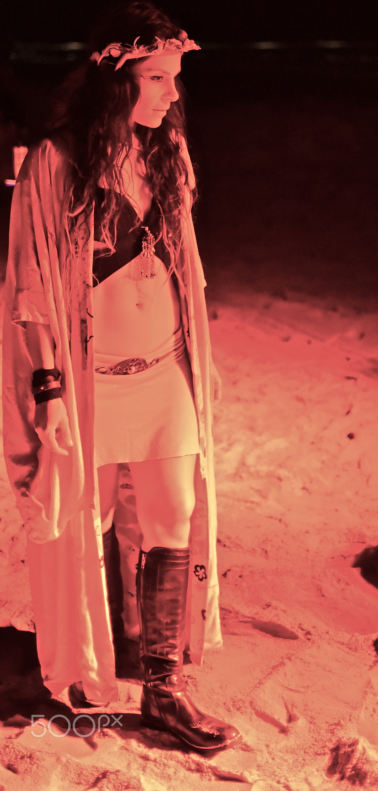 Nikon AF Nikkor 35mm F2D sample photo. Woman performer at night on beach photography