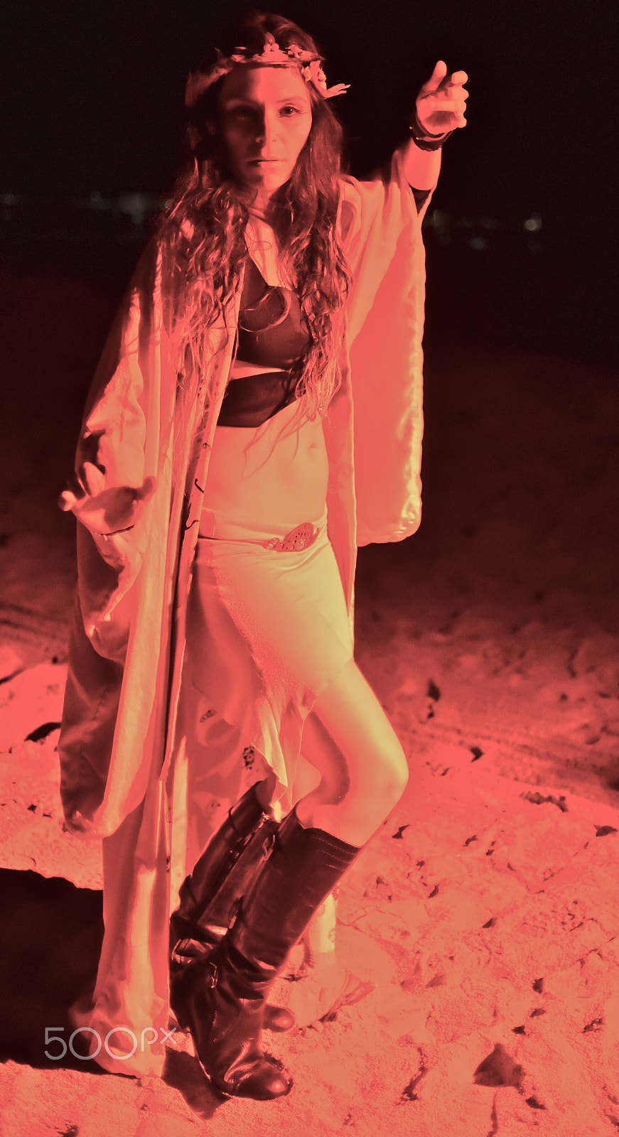 Nikon AF Nikkor 35mm F2D sample photo. Woman performer at night on beach photography