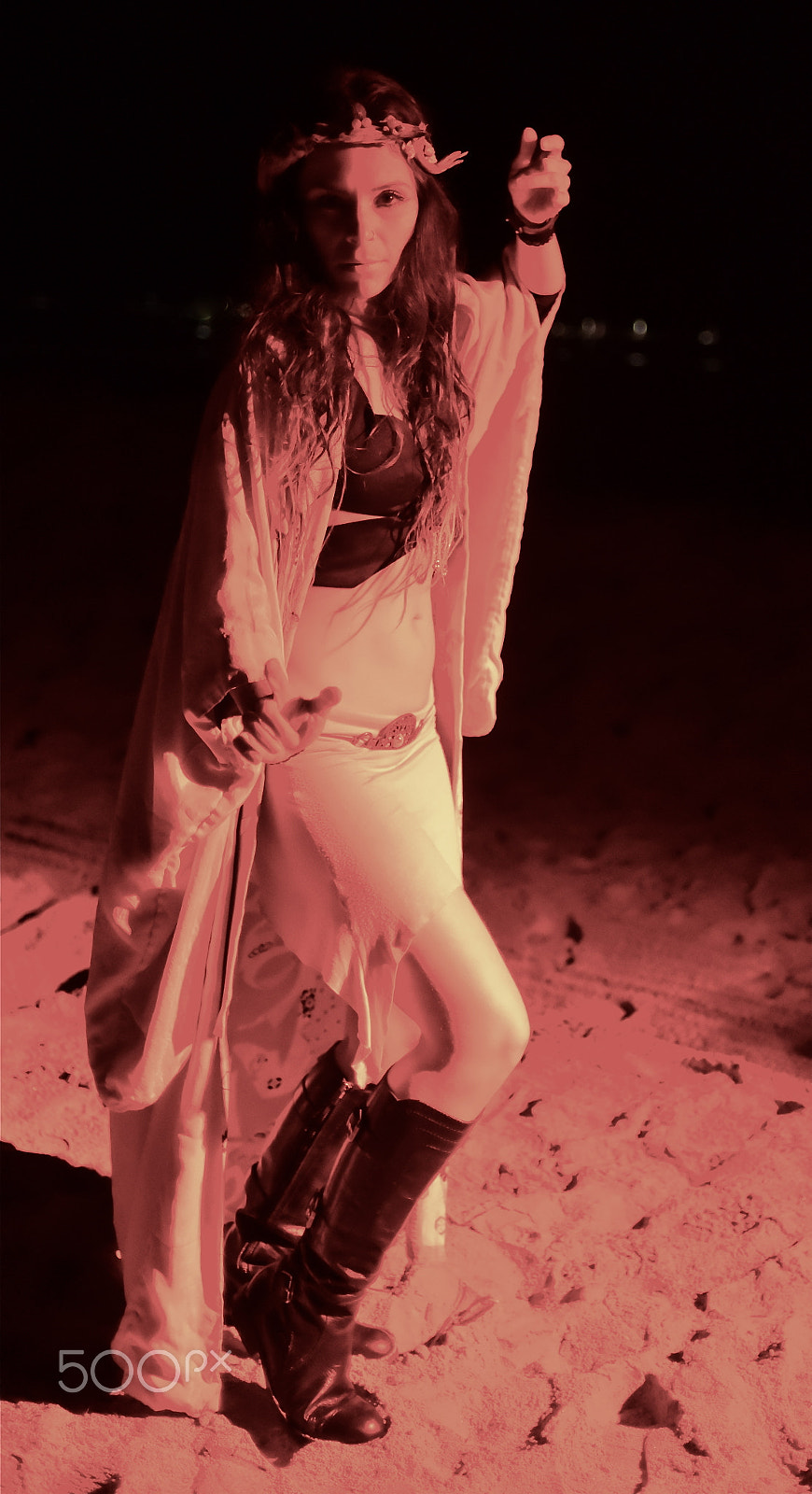 Nikon AF Nikkor 35mm F2D sample photo. Woman performer at night on beach photography