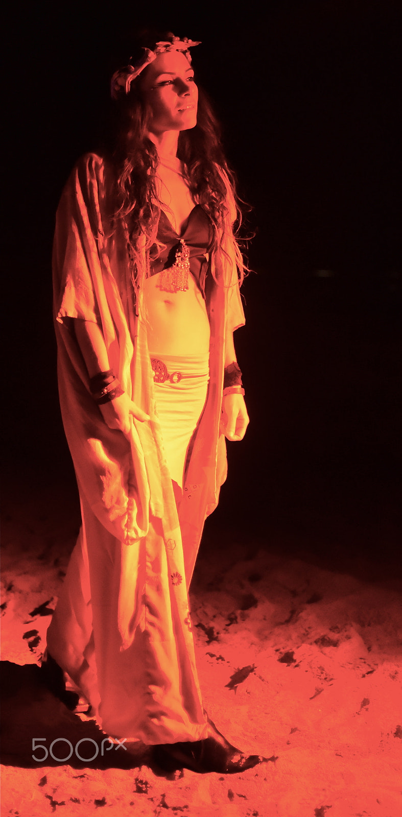Nikon D750 + Nikon AF Nikkor 35mm F2D sample photo. Woman performer at night on beach photography