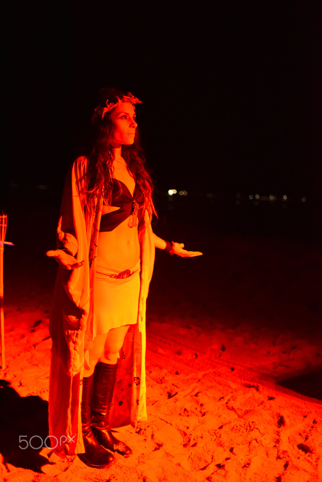 Nikon D750 + Nikon AF Nikkor 35mm F2D sample photo. Woman performer at night on beach photography