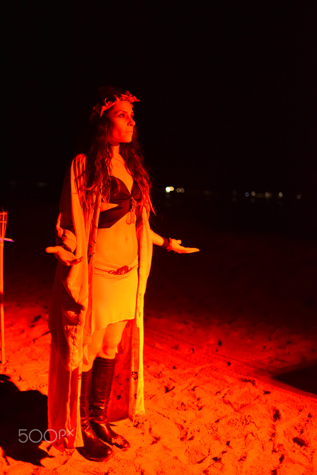 Nikon AF Nikkor 35mm F2D sample photo. Woman performer at night on beach photography