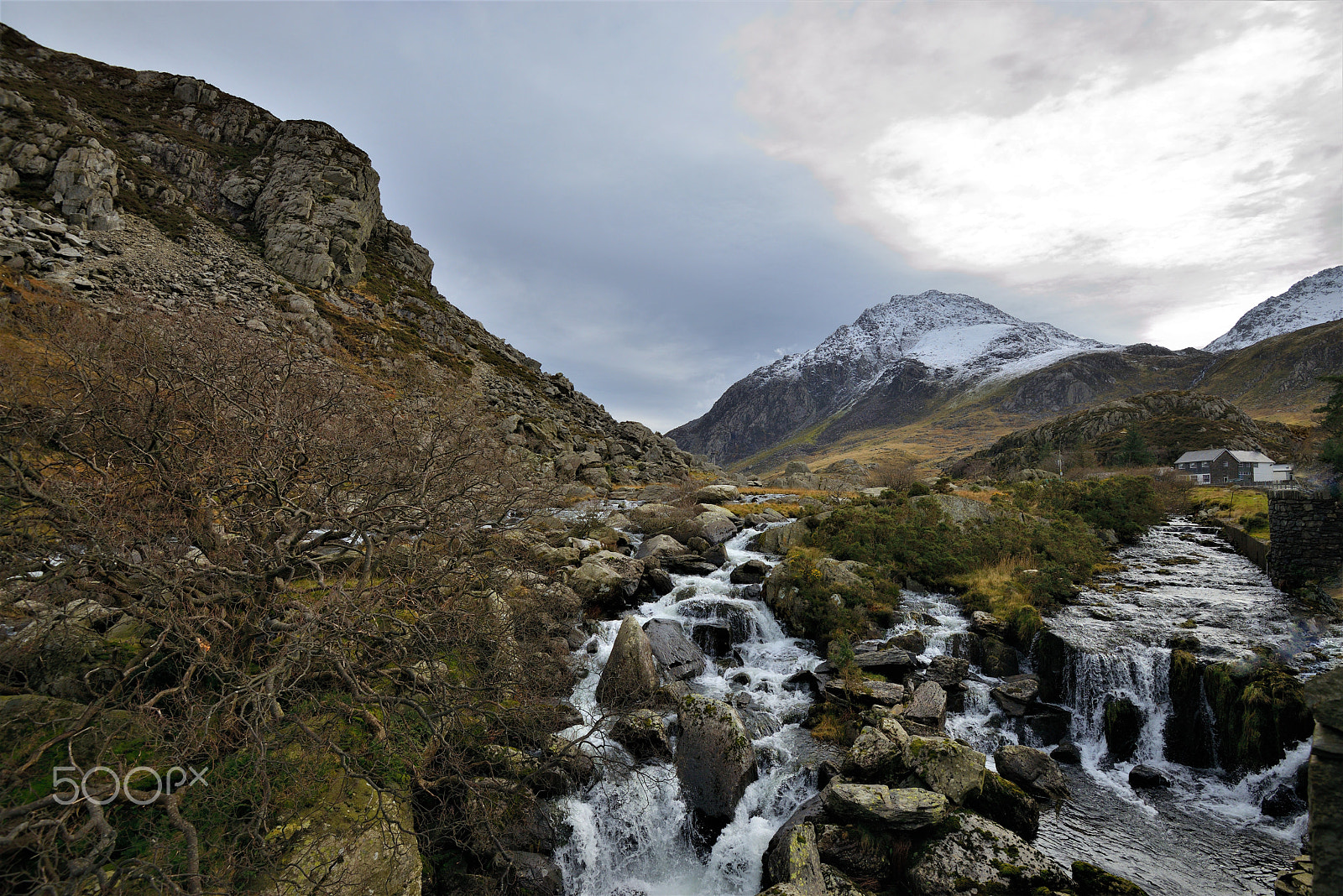 Nikon AF-S Nikkor 16-35mm F4G ED VR sample photo. Snow melt waterfall photography