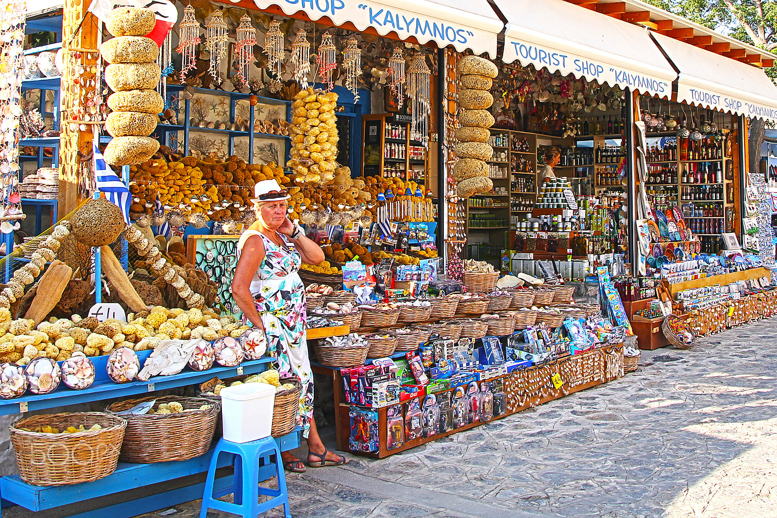 Canon TS-E 90mm F2.8 Tilt-Shift sample photo. Greek shopkeeper photography