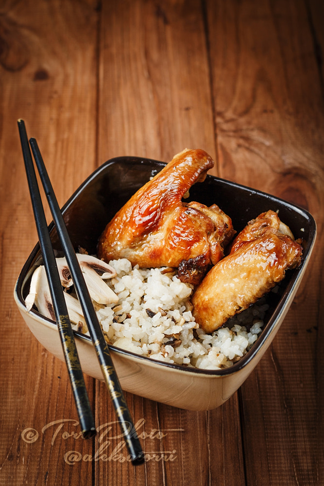 Canon EOS 650D (EOS Rebel T4i / EOS Kiss X6i) + Canon EF 50mm F1.4 USM sample photo. Rice with mushrooms and baked chicken wings photography