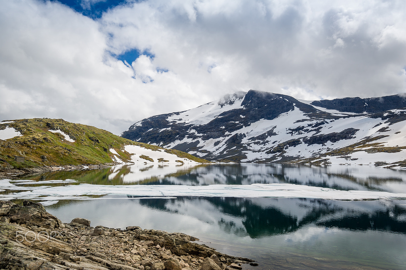 Nikon D3S sample photo. Mountain lake and snowy rocks, norway photography