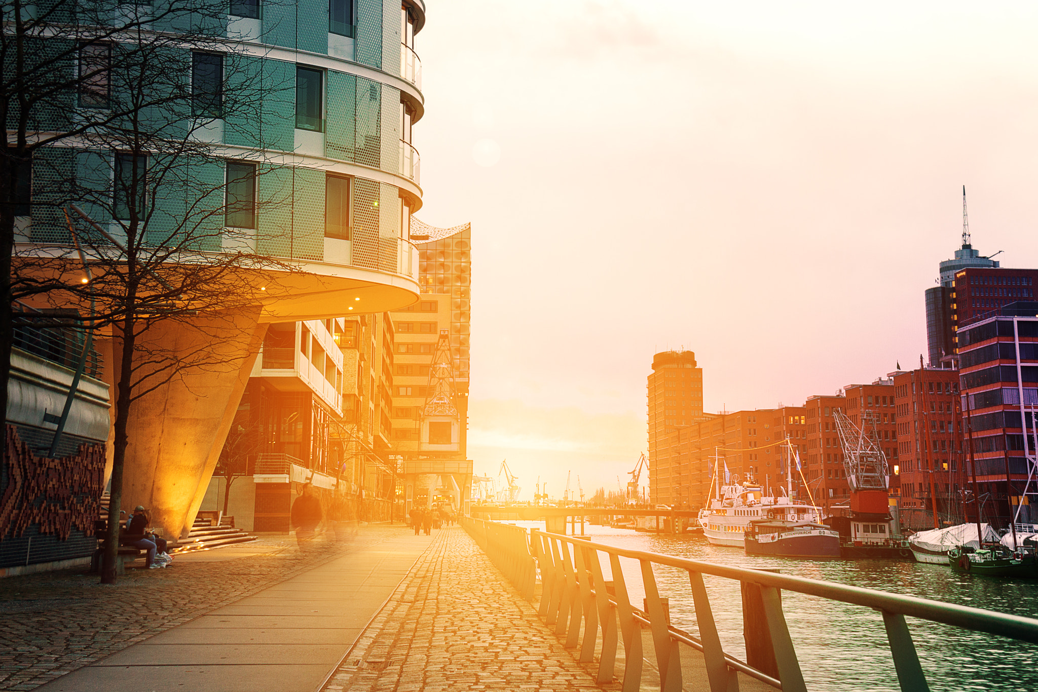 Canon EF 24-70mm F4L IS USM sample photo. Beautiful picture of sunset in port city with water, ships and b photography