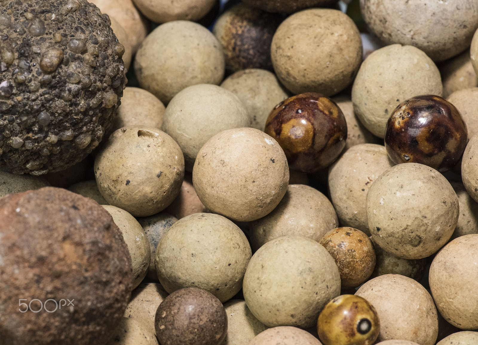 Nikon D810 + Tokina AT-X Pro 100mm F2.8 Macro sample photo. Antique stone marbles photography