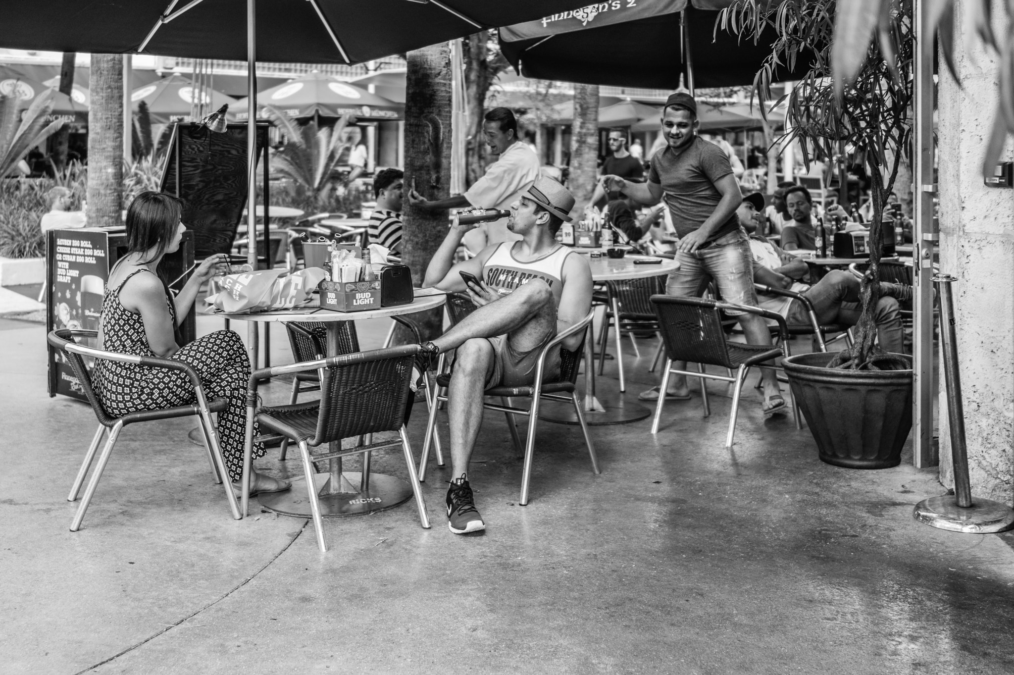 35mm F2.0 sample photo. People of miami -  just chillin'...... photography