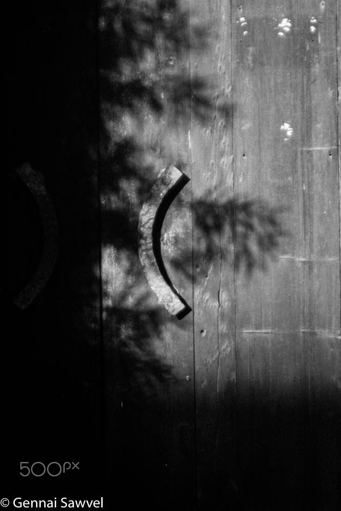 Sigma 28-80mm f/3.5-5.6 II Macro sample photo. Shadow on old door photography
