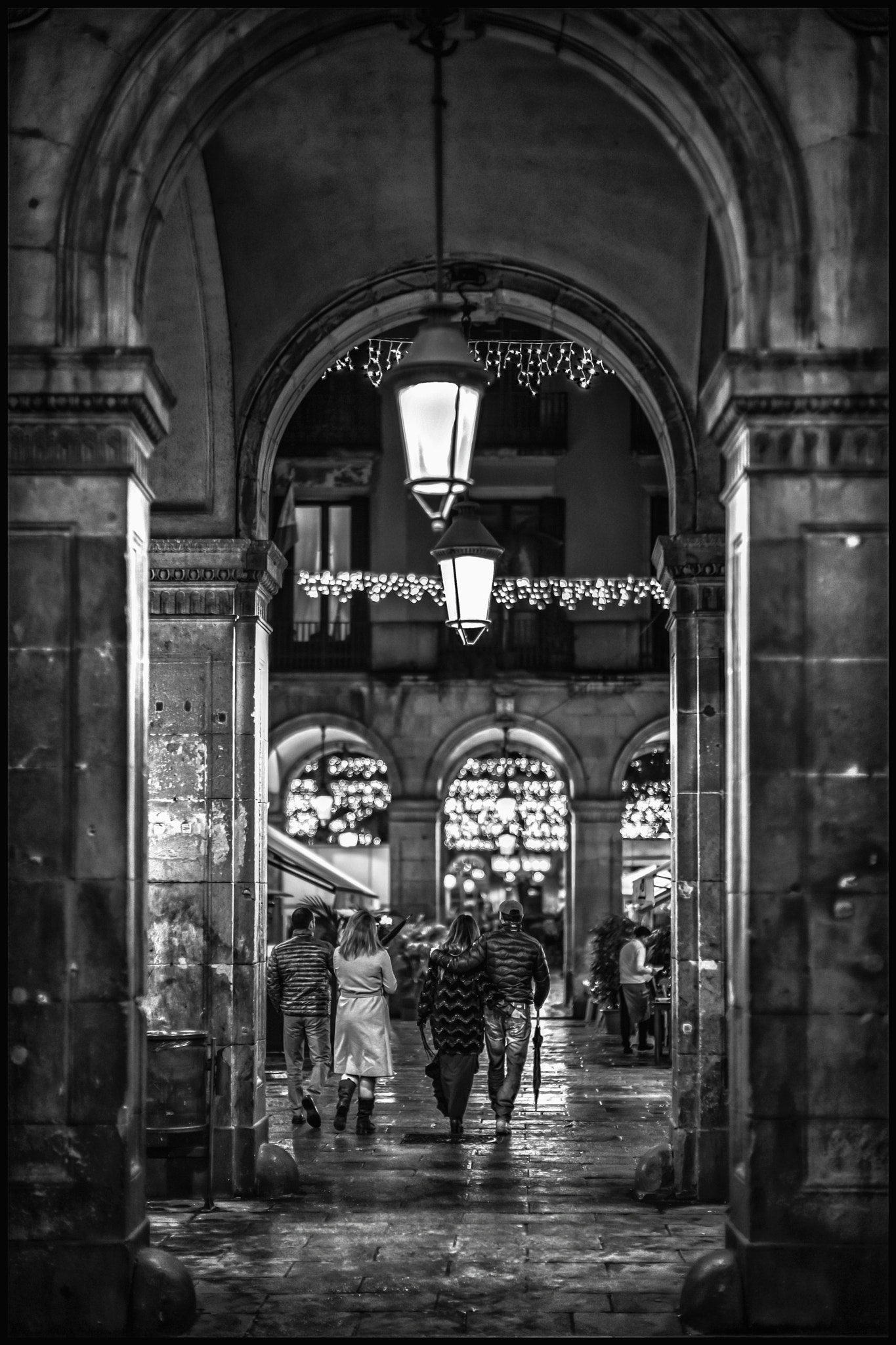 Leica Noctilux-M 50mm F0.95 ASPH sample photo. Walking through arches,... hand in the pocket... photography
