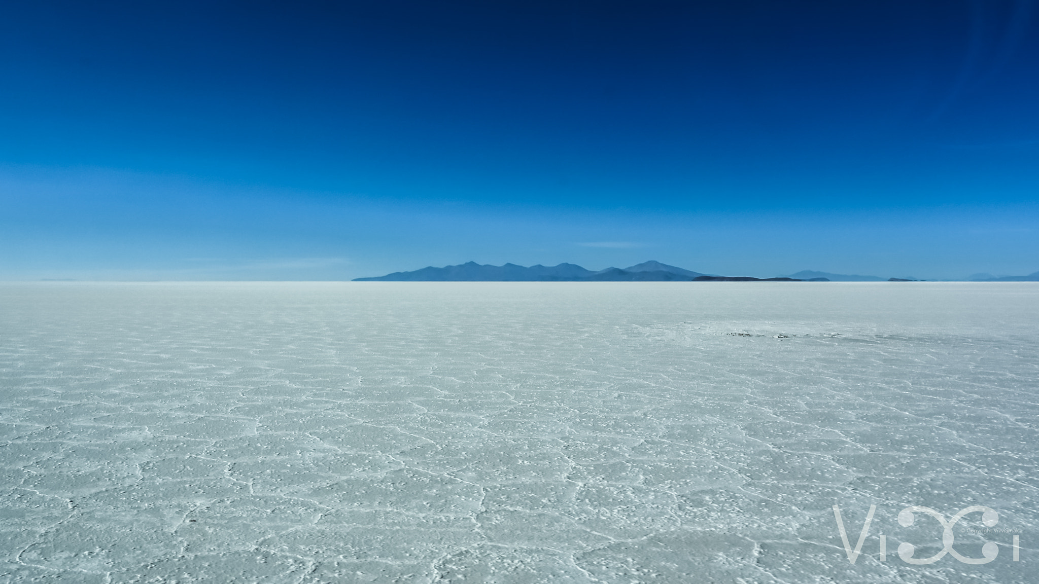 Panasonic Lumix DMC-GH4 sample photo. Salar uyuni with volcano tunupa photography