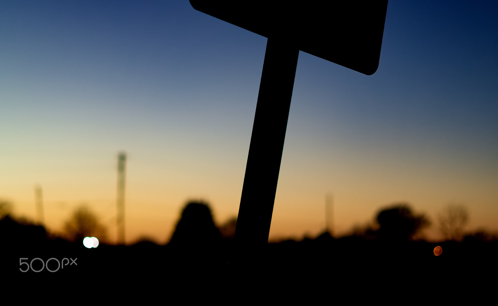 50mm F1.8 sample photo. Signs in twilight photography