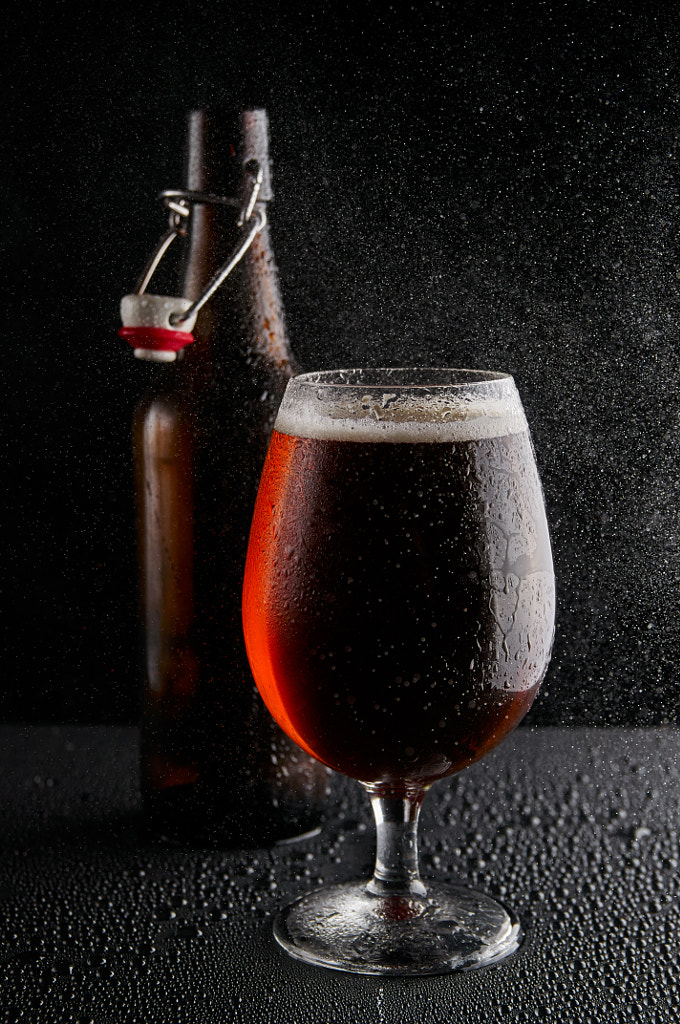 Beer in glass on a black background by Krzysztof on 500px.com