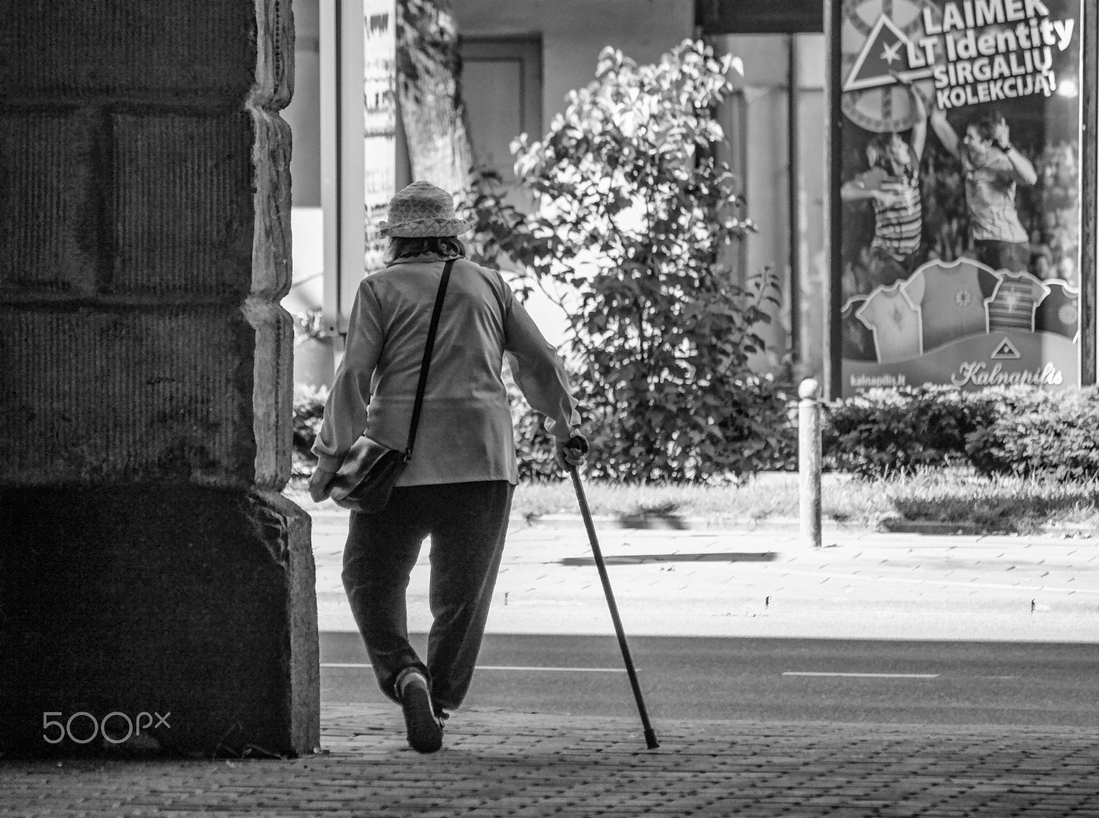 Canon EF-S 55-250mm F4-5.6 IS sample photo. Old dame with walking stick photography