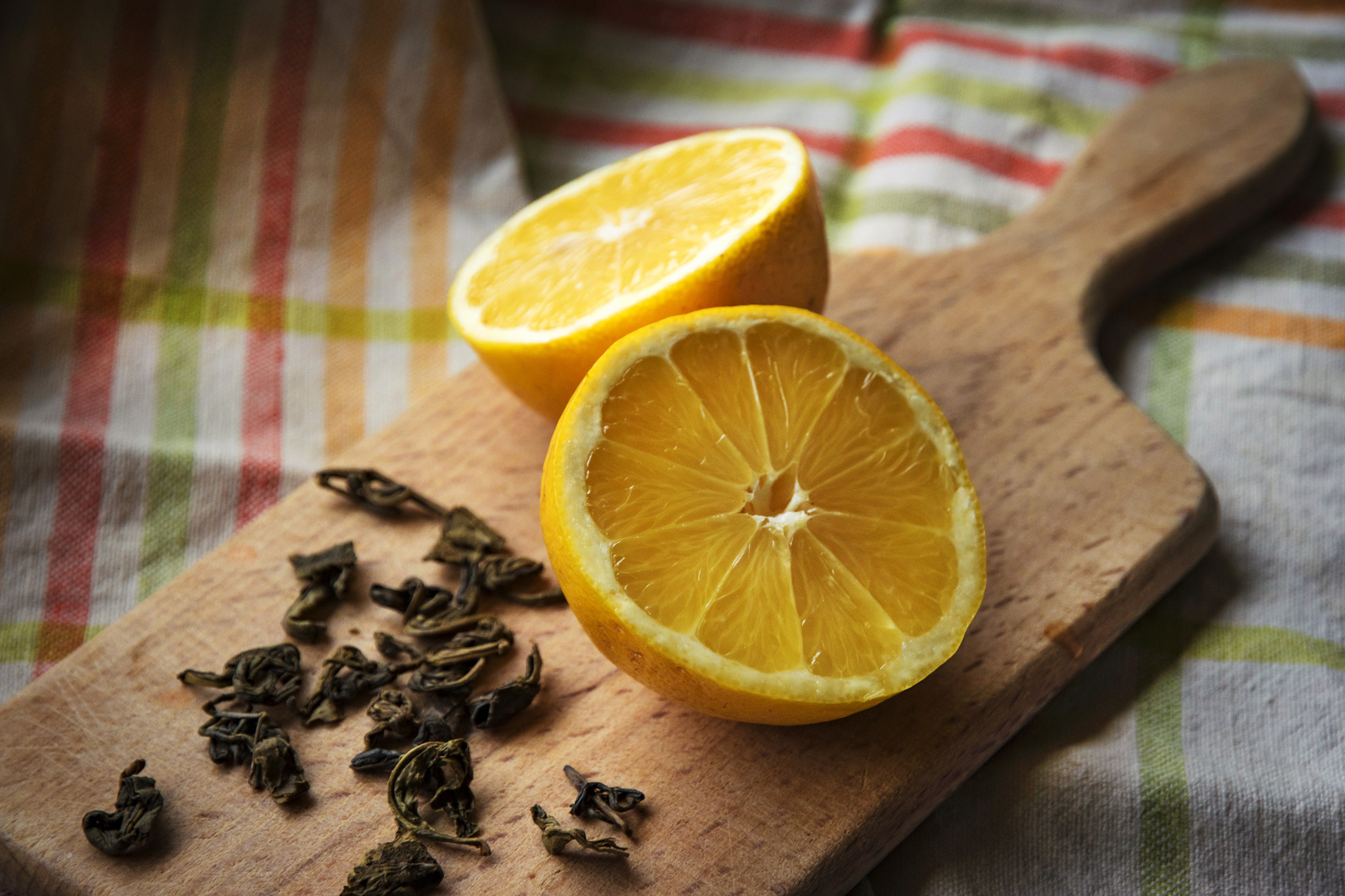 Nikon D5500 sample photo. Split in half a lemon on a wooden board photography