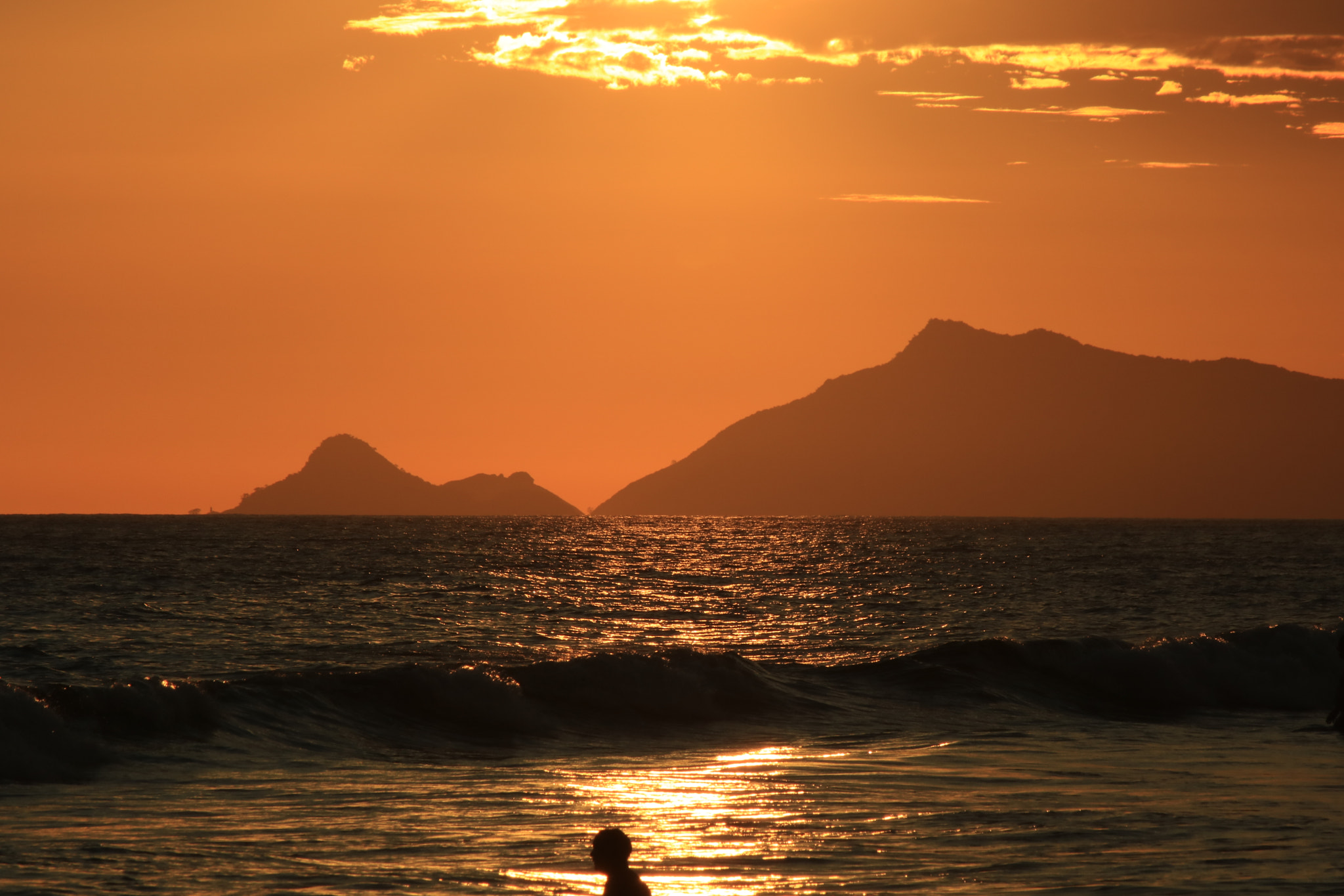 Canon EF-S 55-250mm F4-5.6 IS sample photo. Orange & dark - sea & sky photography
