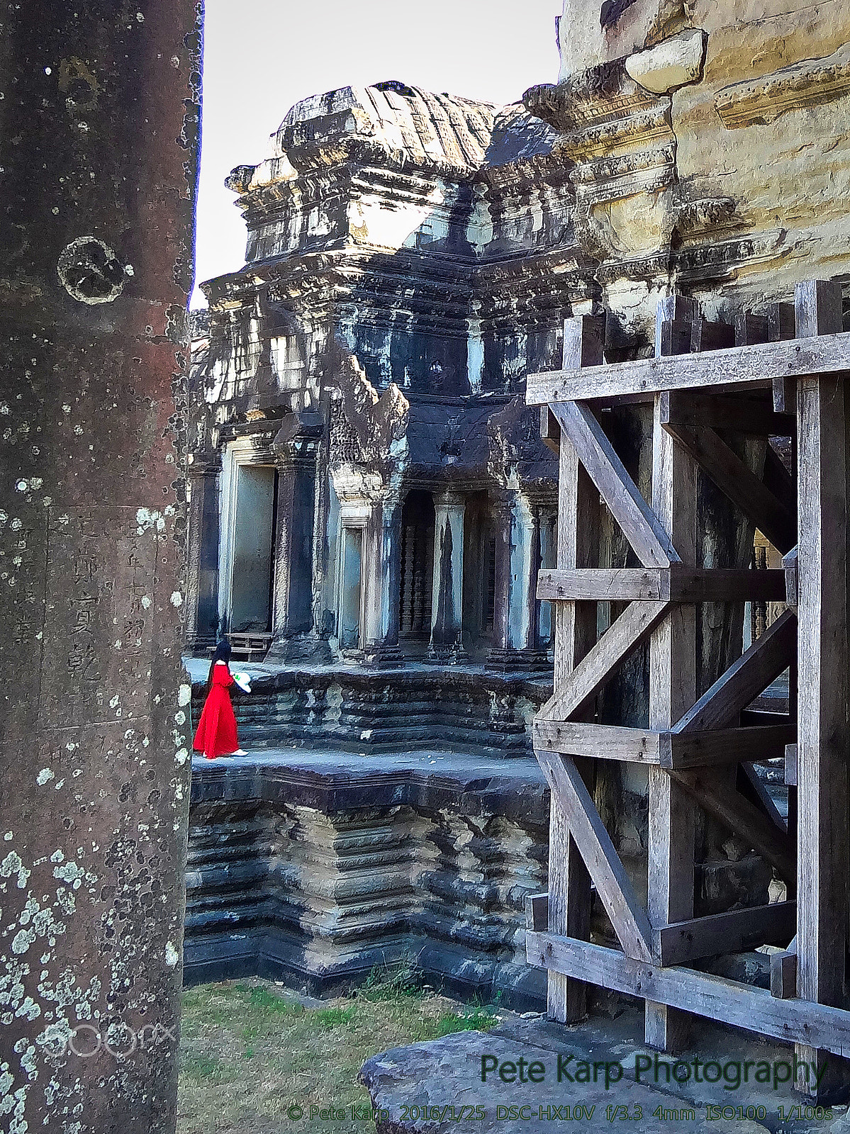 Sony Cyber-shot DSC-HX10V sample photo. The girl in red at angkor wat photography