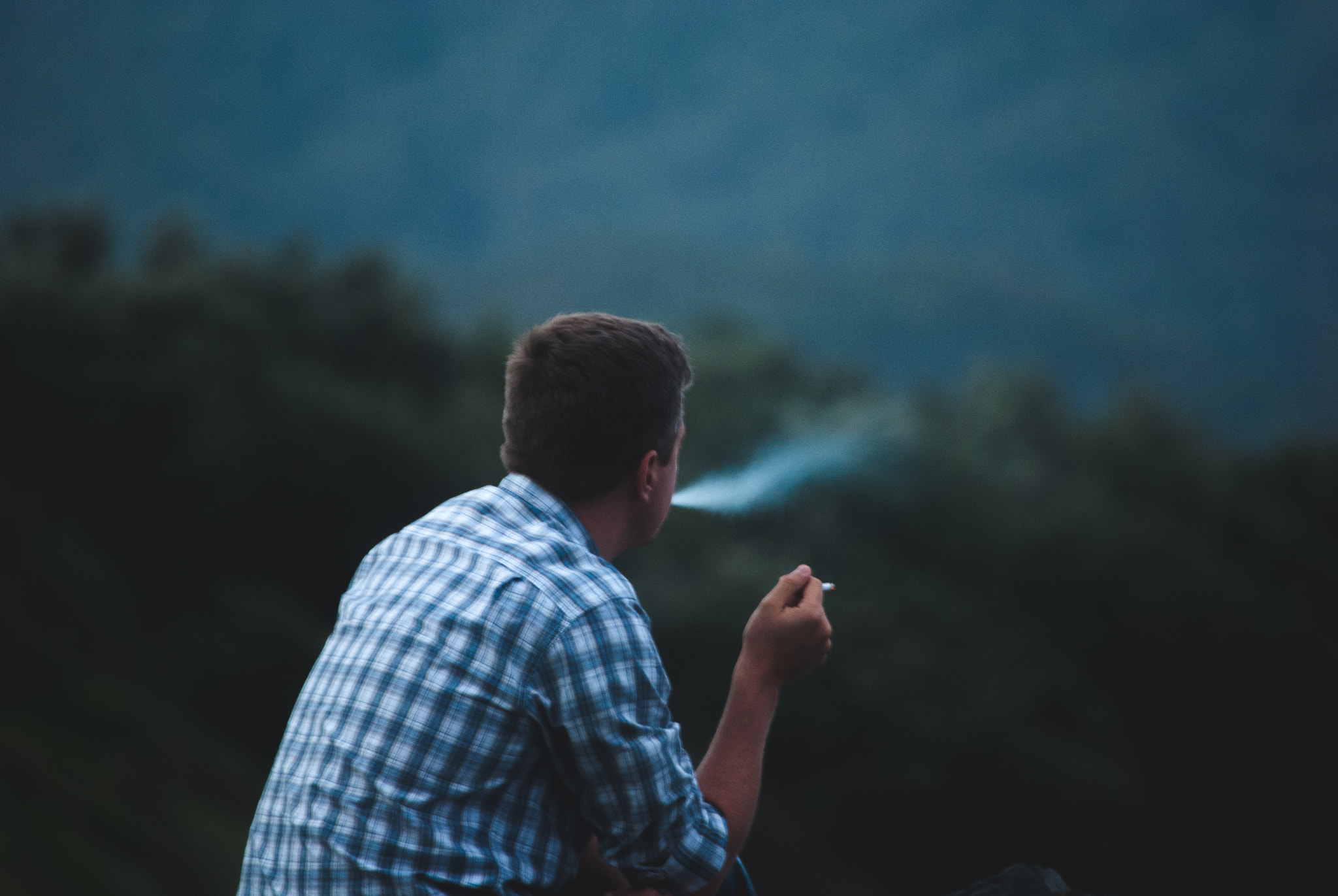 Nikon D3000 sample photo. Smoking stranger photography