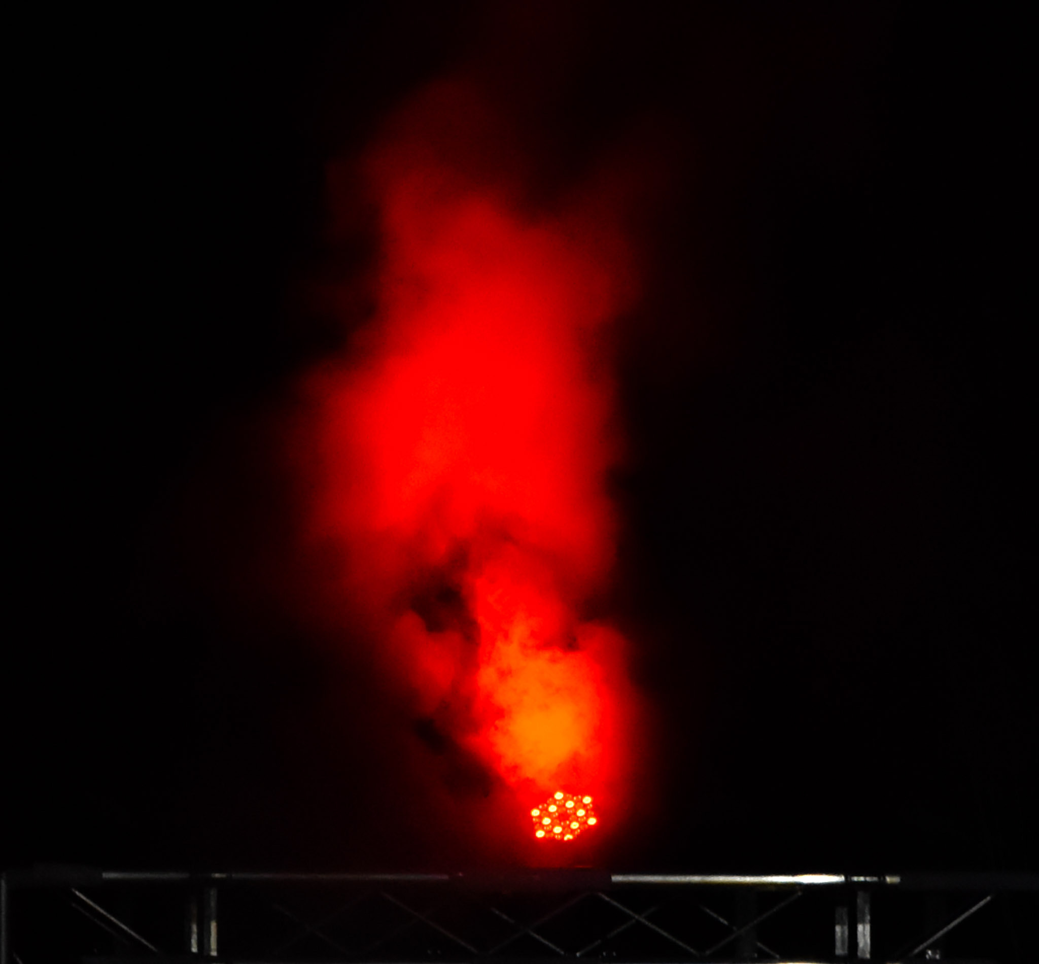 Sigma 70-200mm F2.8 EX DG OS HSM sample photo. Find the face in the smoke photography