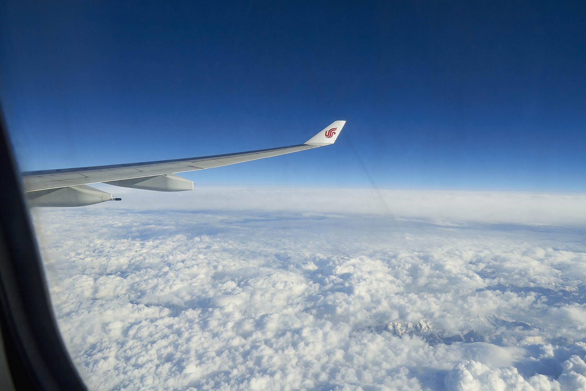 Canon EF 16-35mm F4L IS USM sample photo. Flew over the alps photography