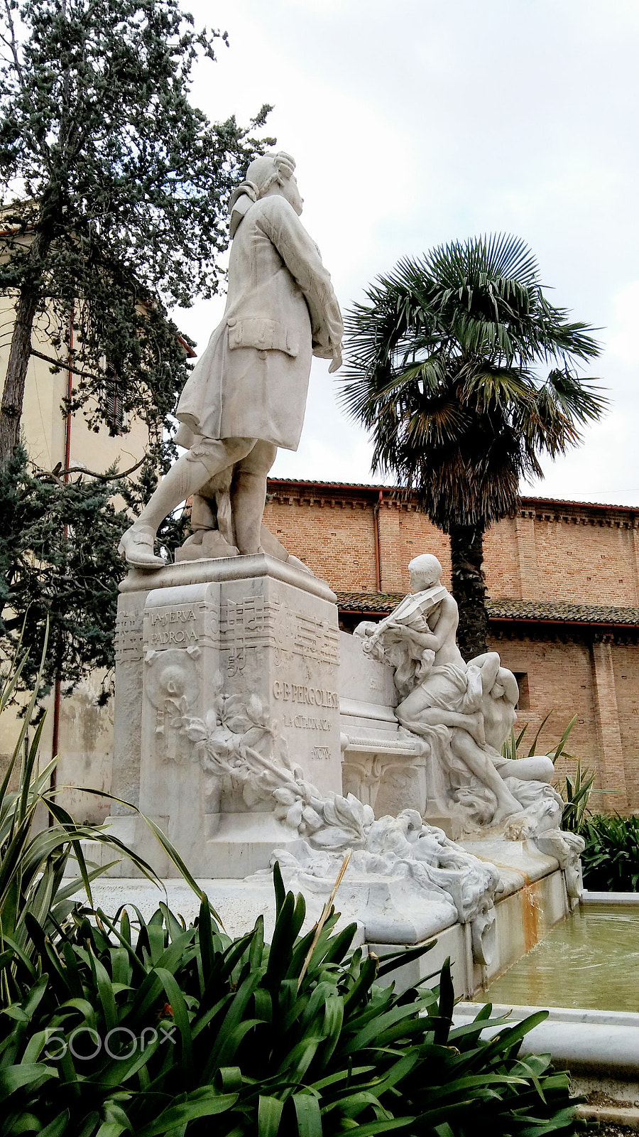 LG K10 sample photo. Details of architecture historical buildings. italy. stone mask. photography