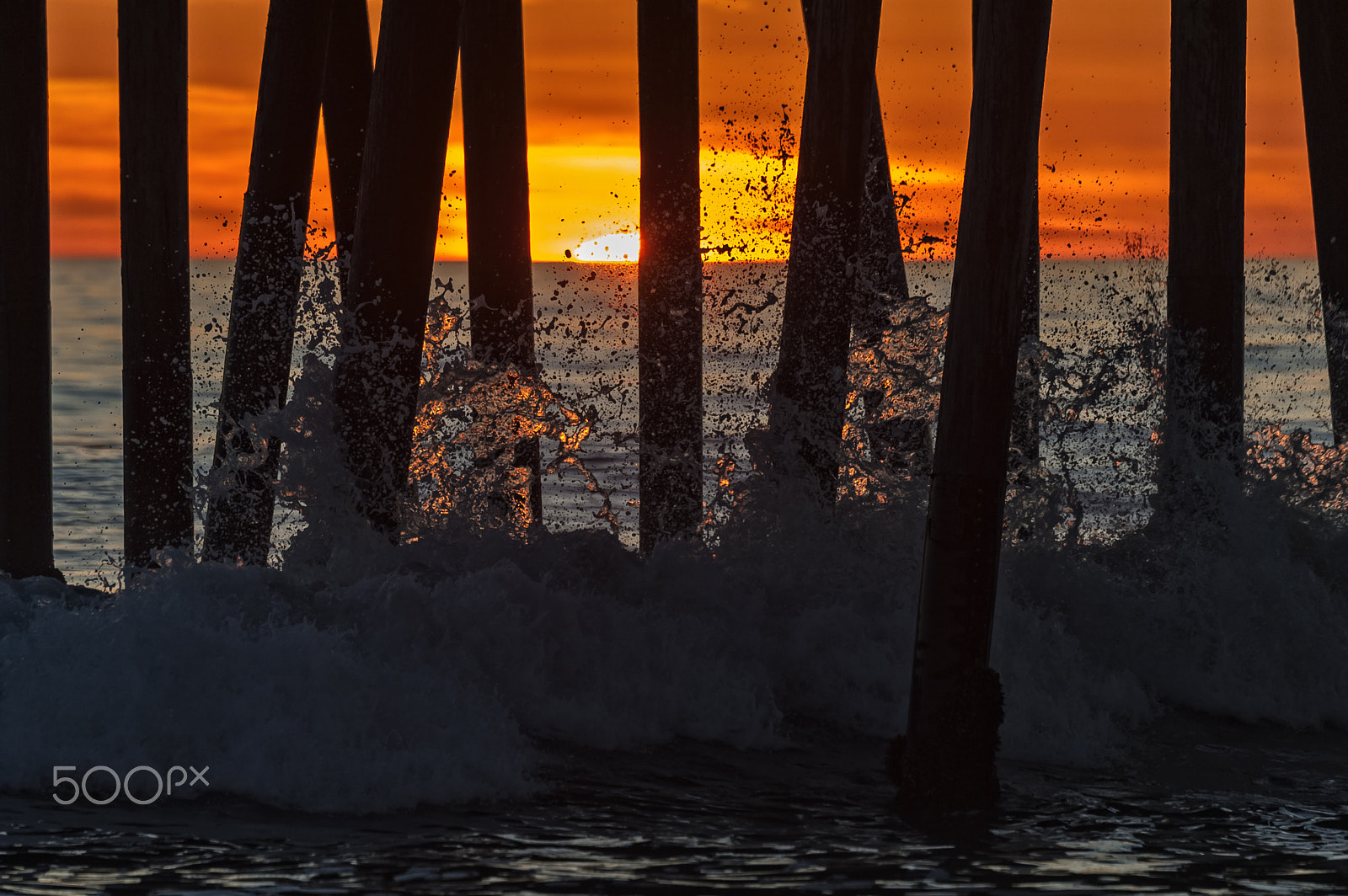 Nikon D700 sample photo. Waves crash on the oceanside pier at sunset photography