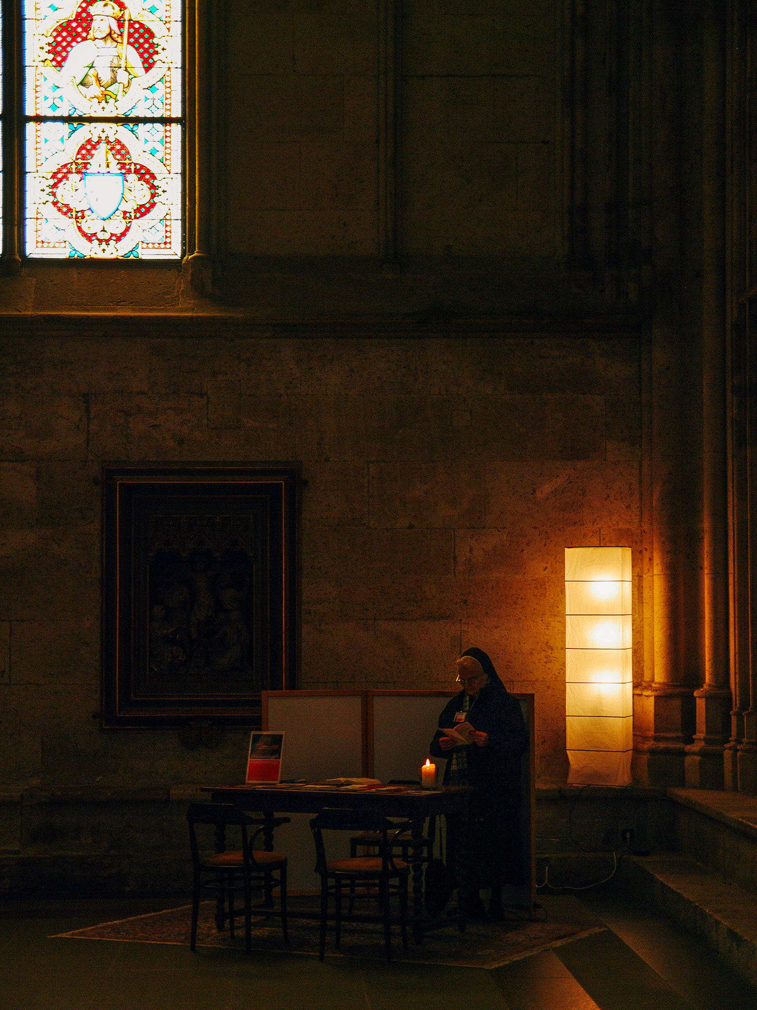 Pentax K20D sample photo. Nun with a candle photography