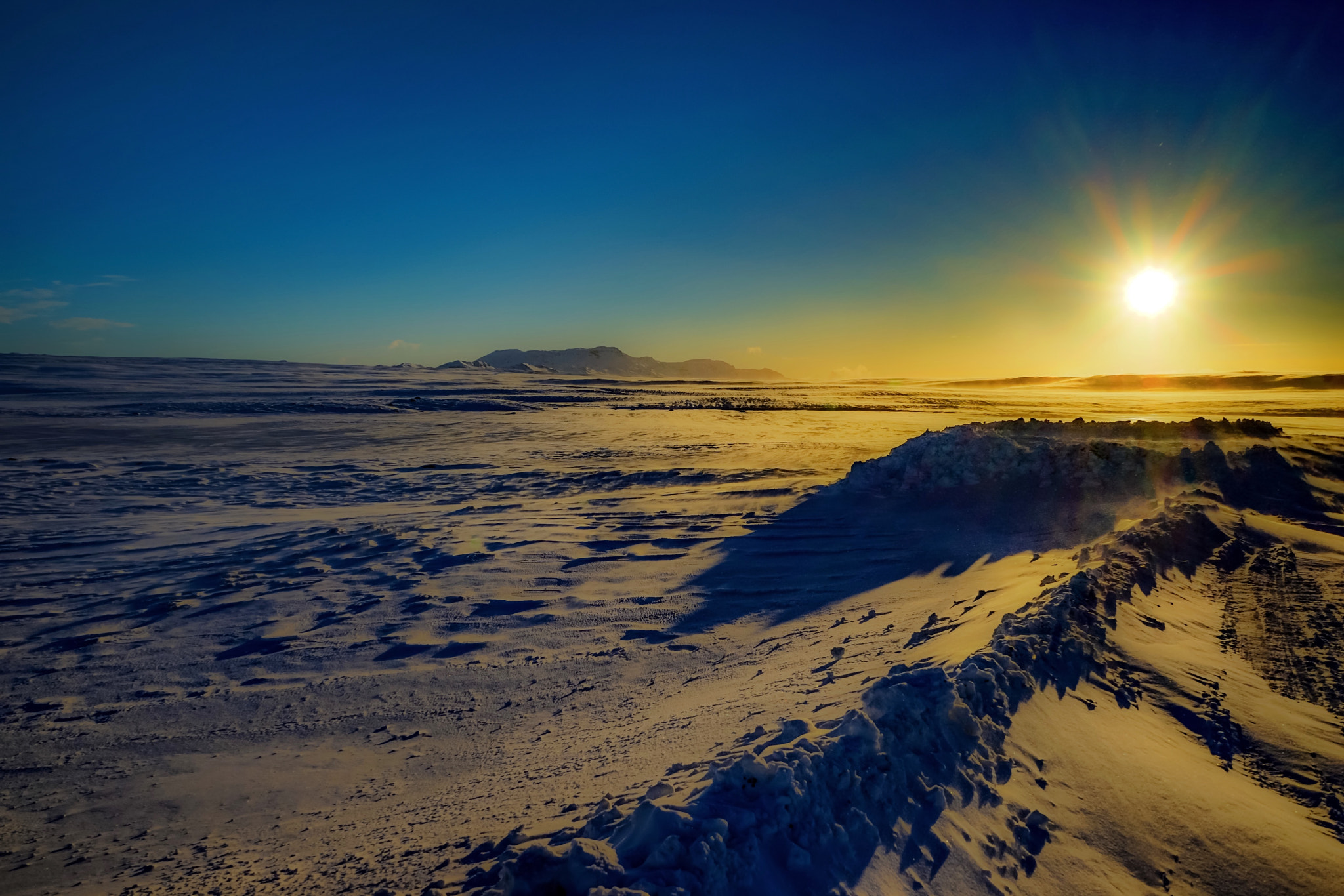 Sony a7R + Sony FE 28-70mm F3.5-5.6 OSS sample photo. Snowy sun photography