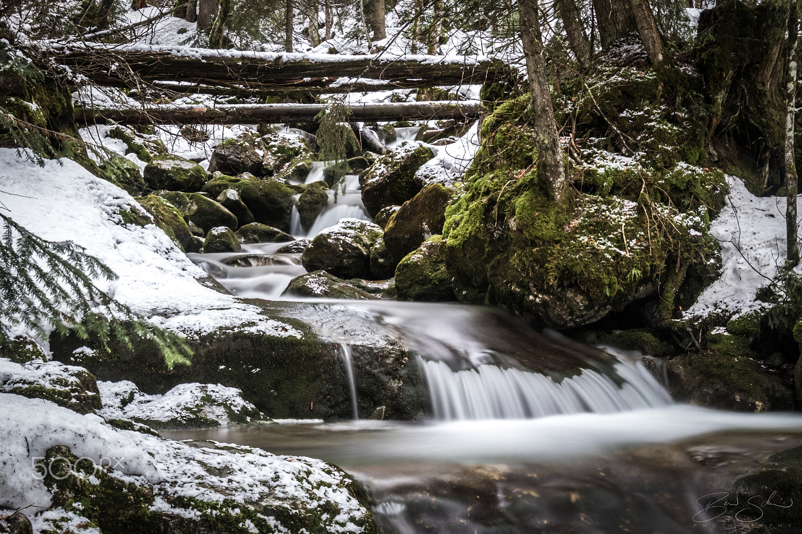 Canon EOS 7D Mark II sample photo. Water flows over terrace photography