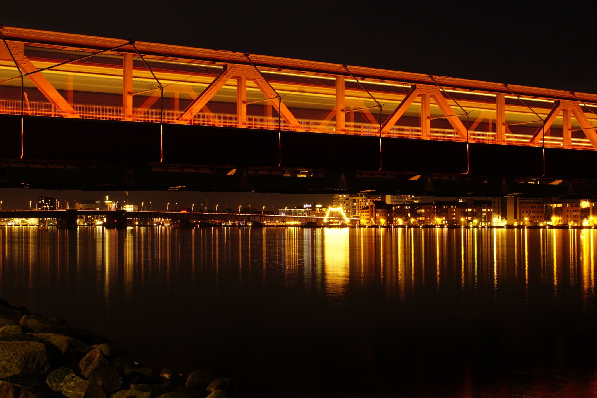 Sony a6000 + Sony DT 18-70mm F3.5-5.6 sample photo. Night photo of a danish city and a train bridge... photography