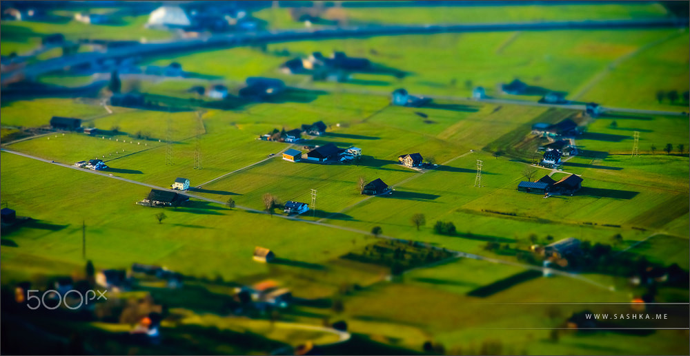 Minolta AF 80-200mm F2.8 HS-APO G sample photo. Miniature tilt-shift aerial view of the village in alps photography
