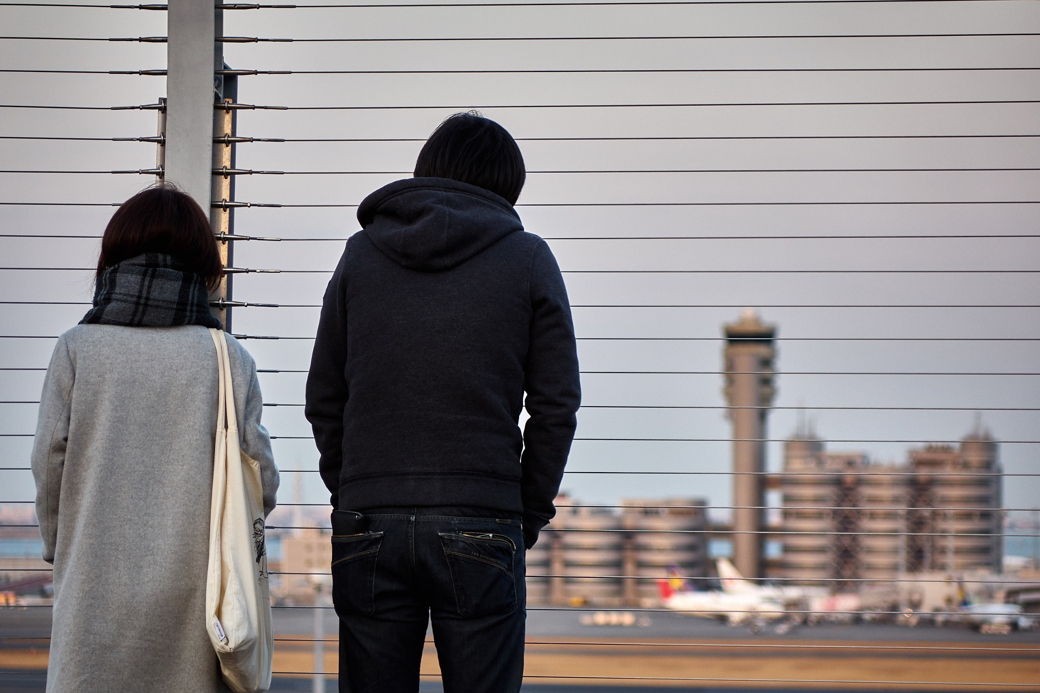 Sony Cyber-shot DSC-RX10 sample photo. Couple at the airport photography