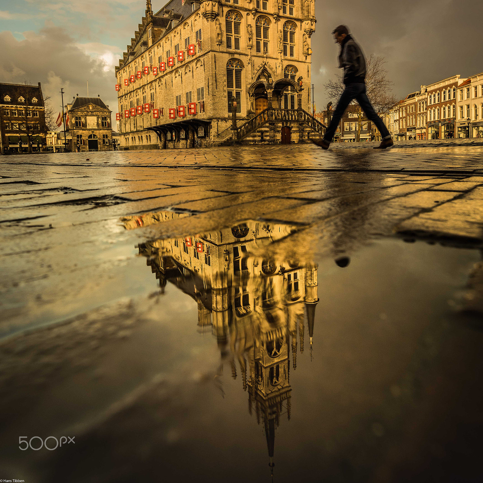 Canon EF 300mm f/2.8L sample photo. Puddle on the marketplace in gouda photography