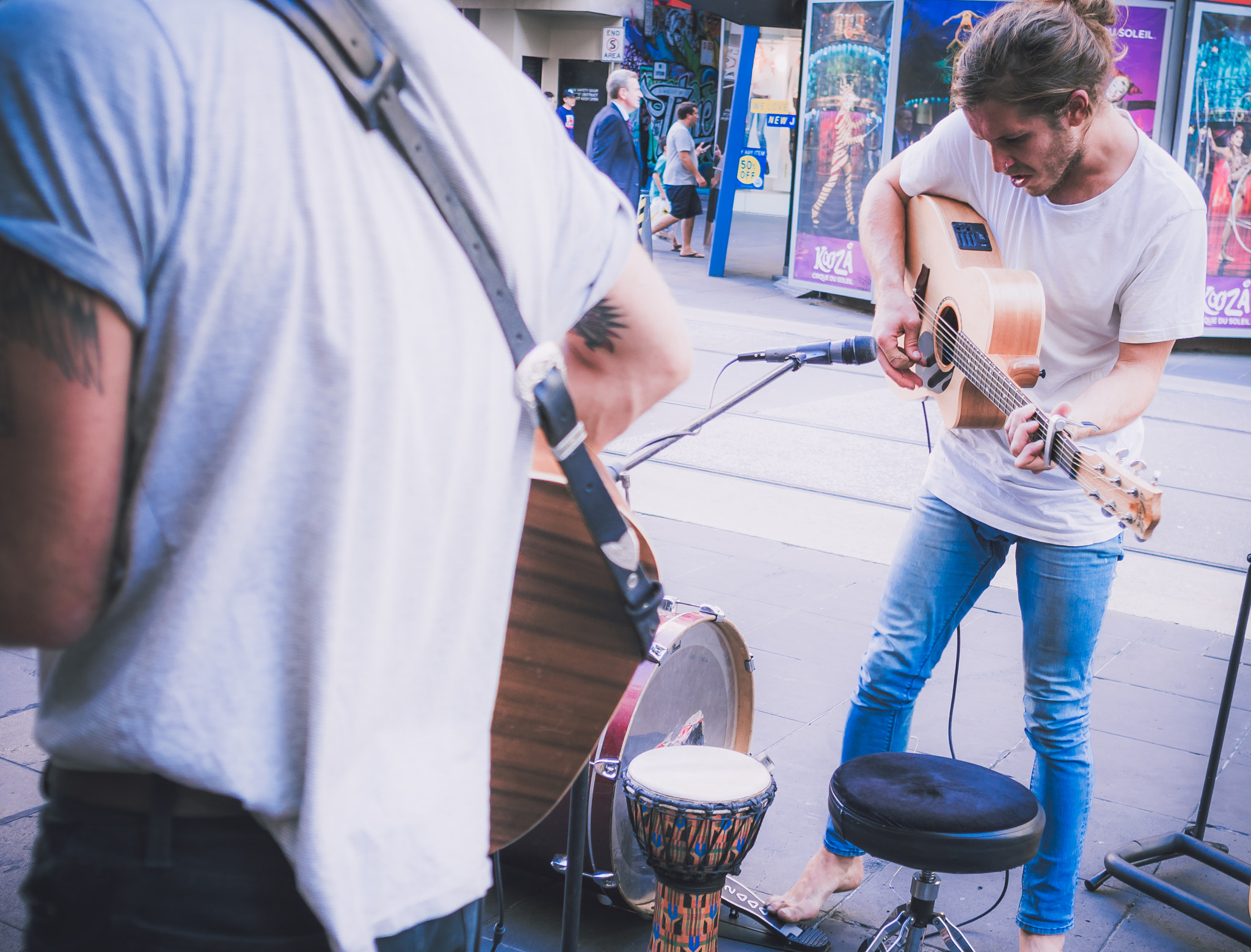 Olympus OM-D E-M5 + Sigma 19mm F2.8 EX DN sample photo. Buskers play for a crowd in bourke st mall photography