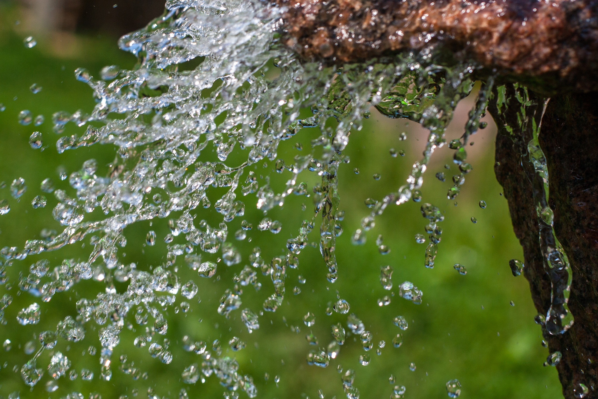 Canon EOS 30D + Canon EF 50mm f/1.8 sample photo. Water splashing falls from rock photography