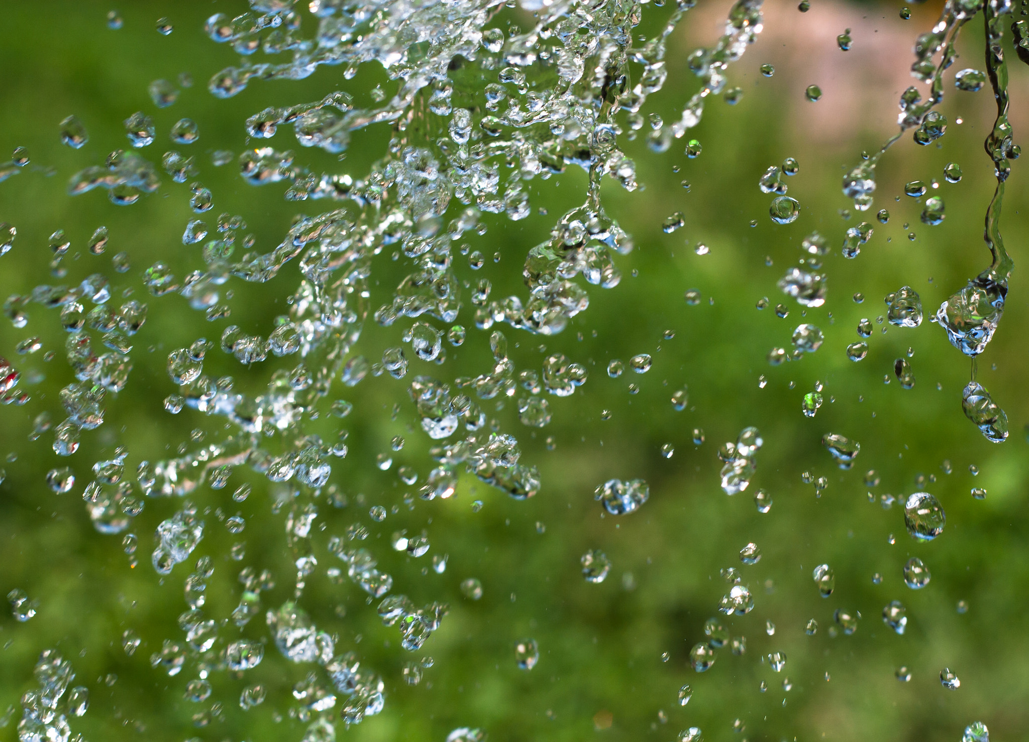 Canon EOS 30D + Canon EF 50mm f/1.8 sample photo. Water dropls fly in the air. photography