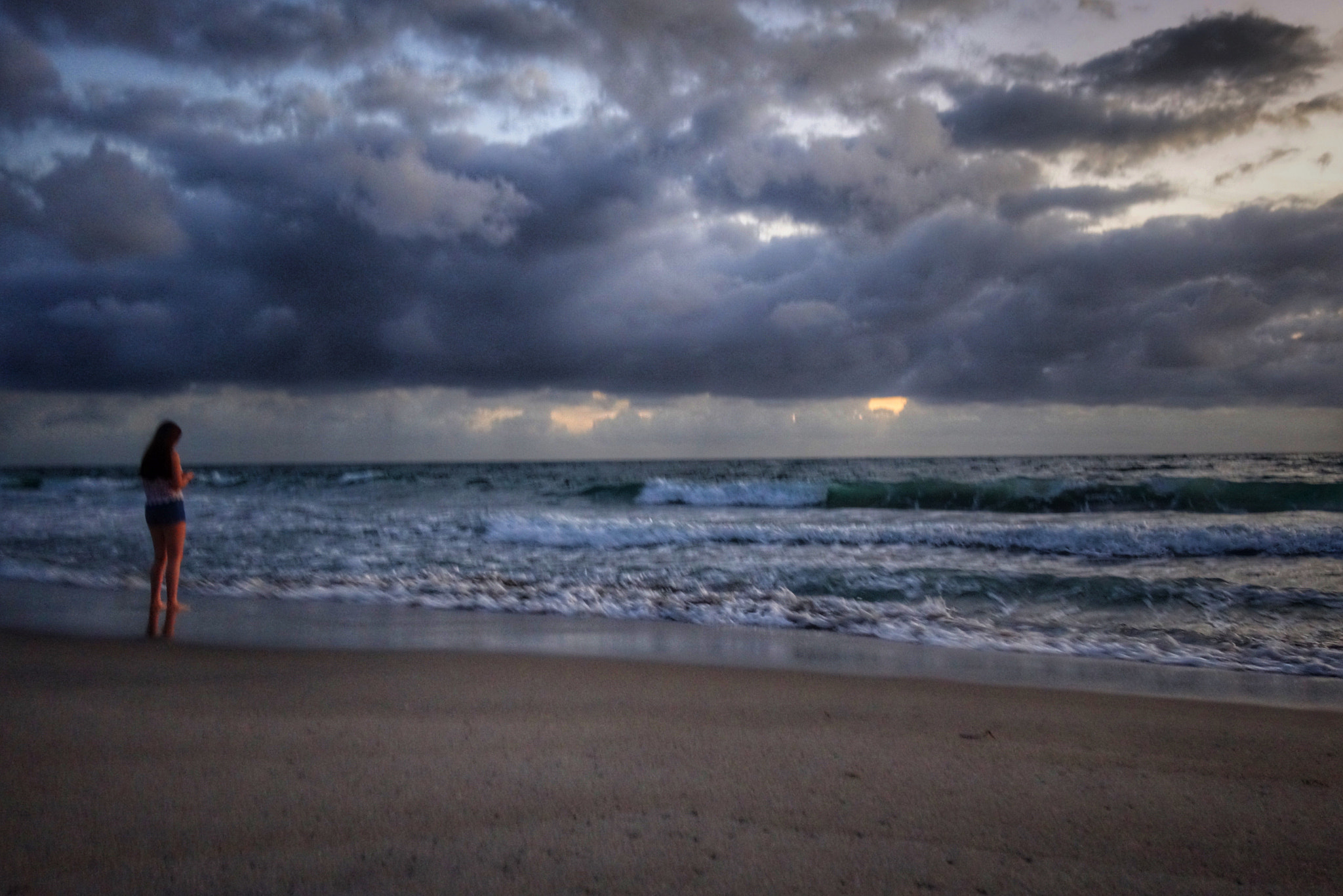 Sony 28-100mm F1.8-4.9 sample photo. Watching the waves photography