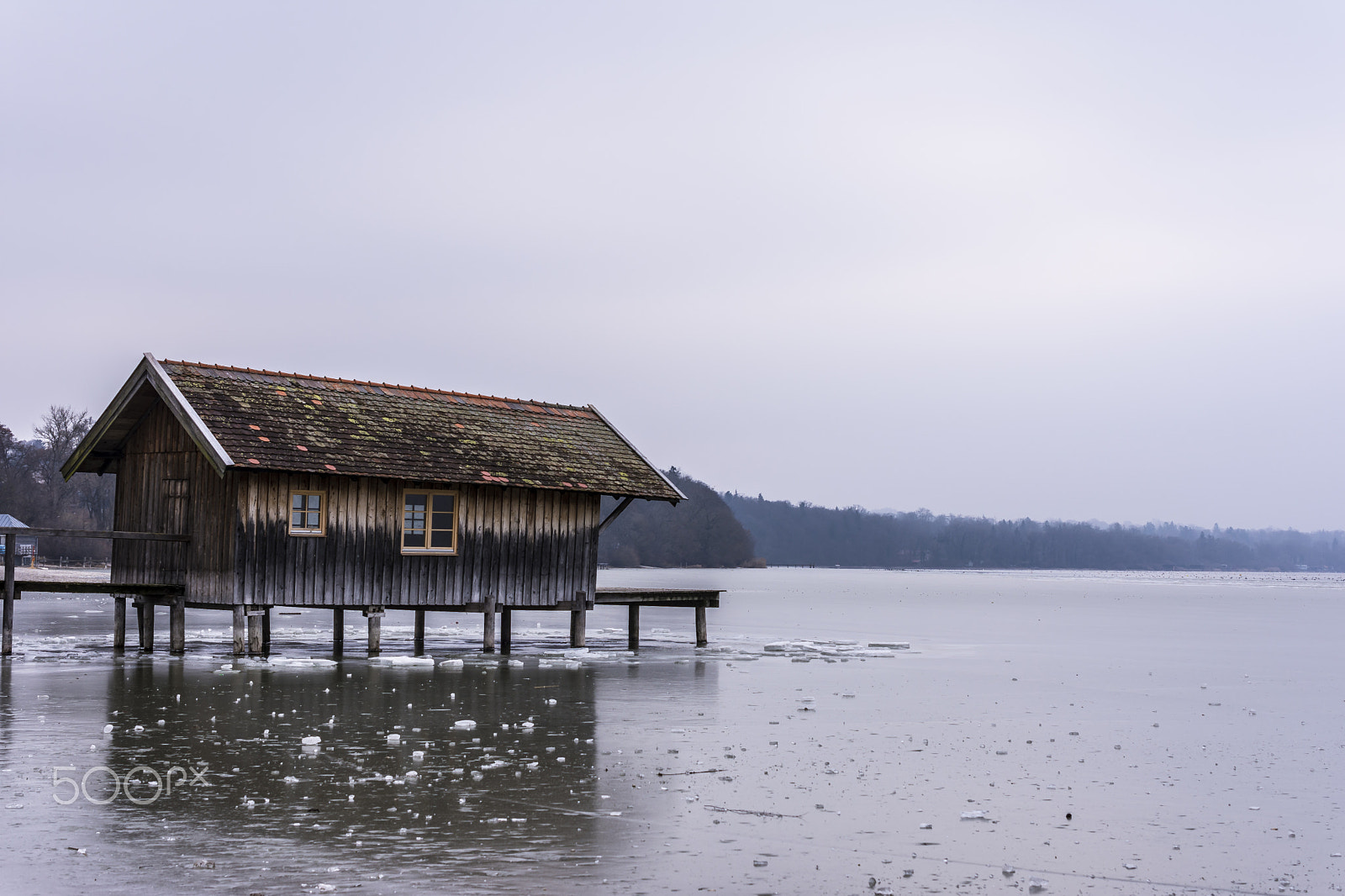 Nikon AF-S DX Micro Nikkor 40mm F2.8 sample photo. Boat house on a frozen lake photography