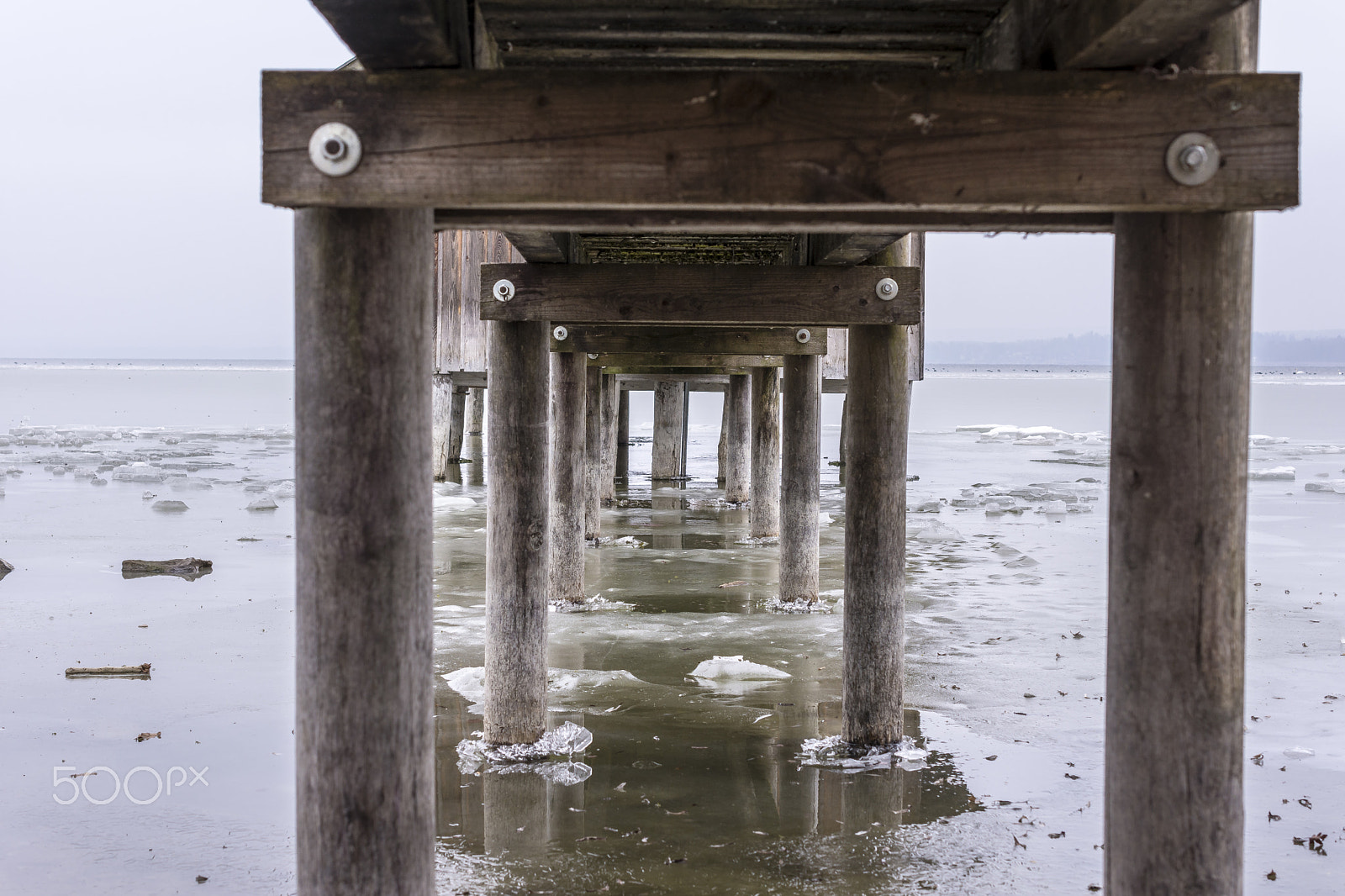 Nikon AF-S DX Micro Nikkor 40mm F2.8 sample photo. Boat house on a frozen lake photography